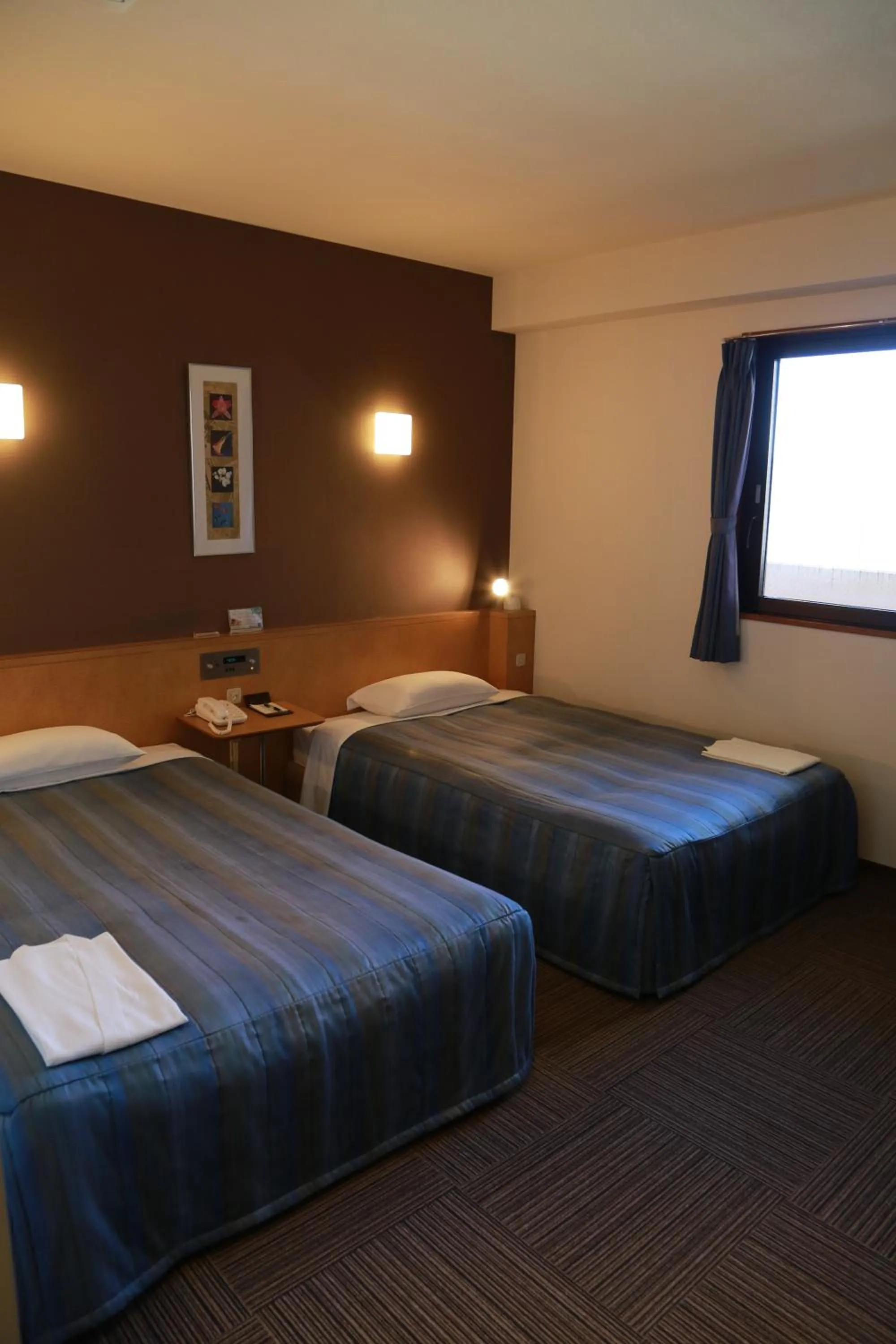 Bed in Hotel Plaza Arakawaoki