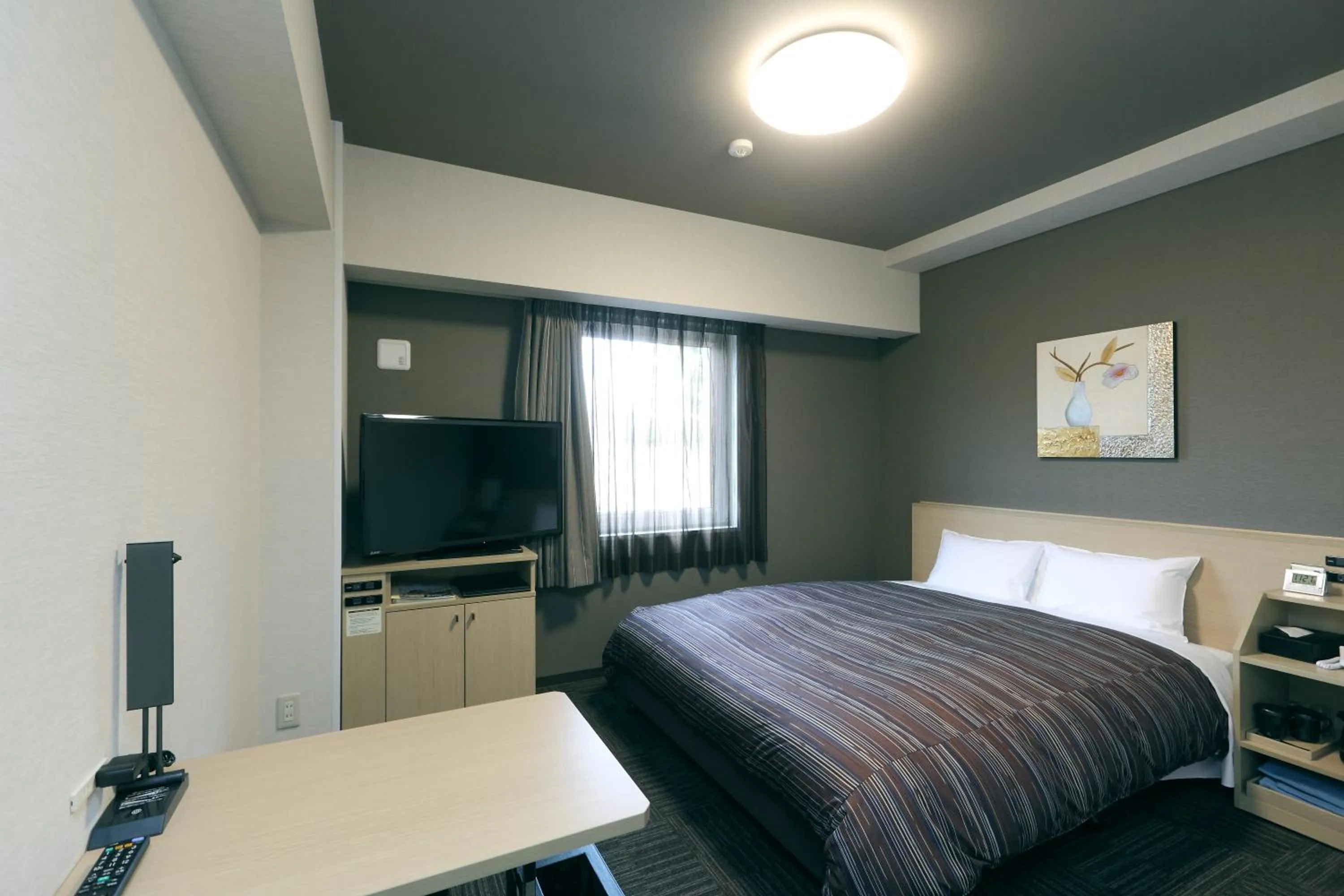 Photo of the whole room, Bed in Hotel Route-Inn Shimizu Inter