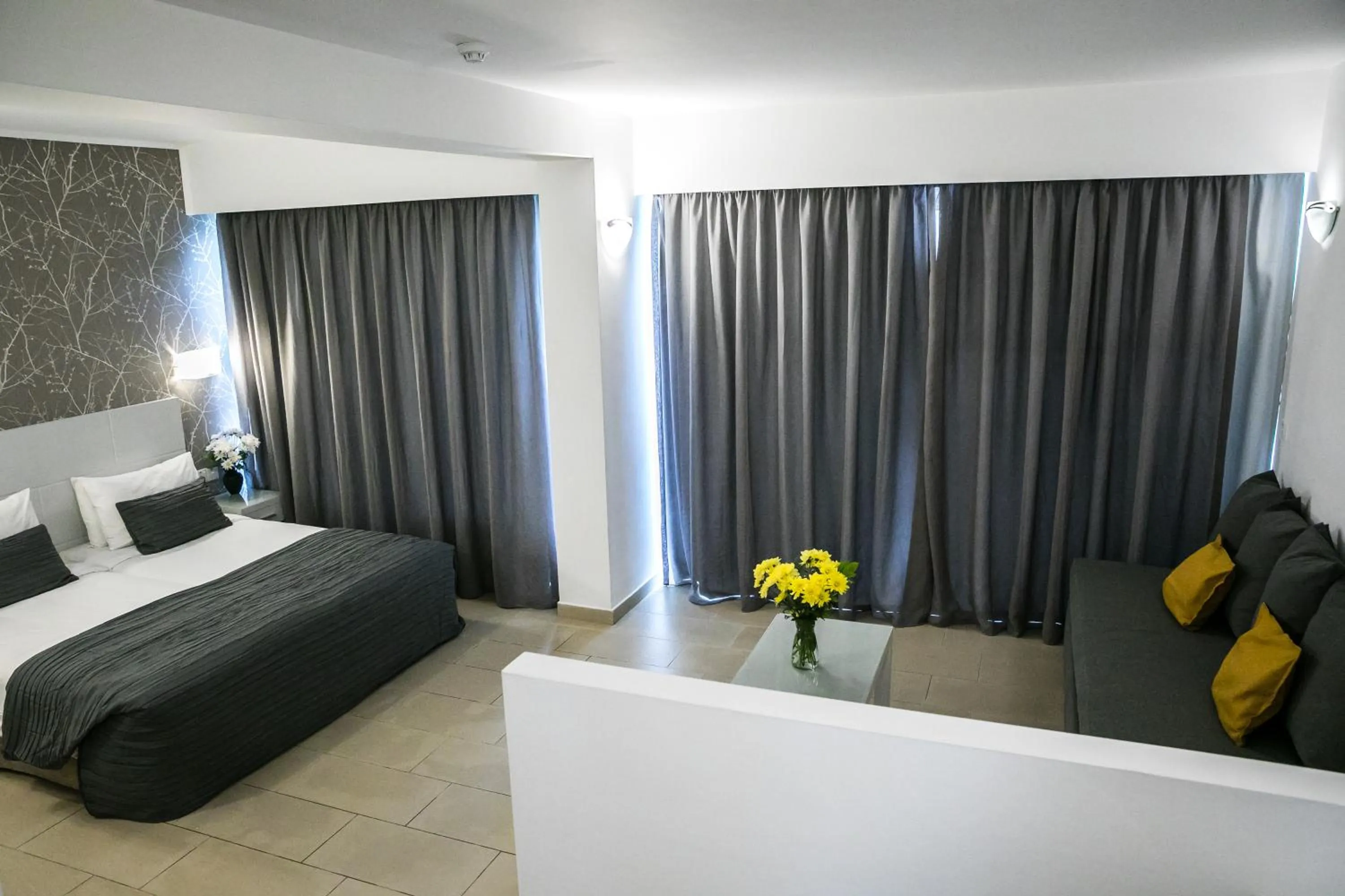 Photo of the whole room, Bed in Theo Sunset Bay Hotel