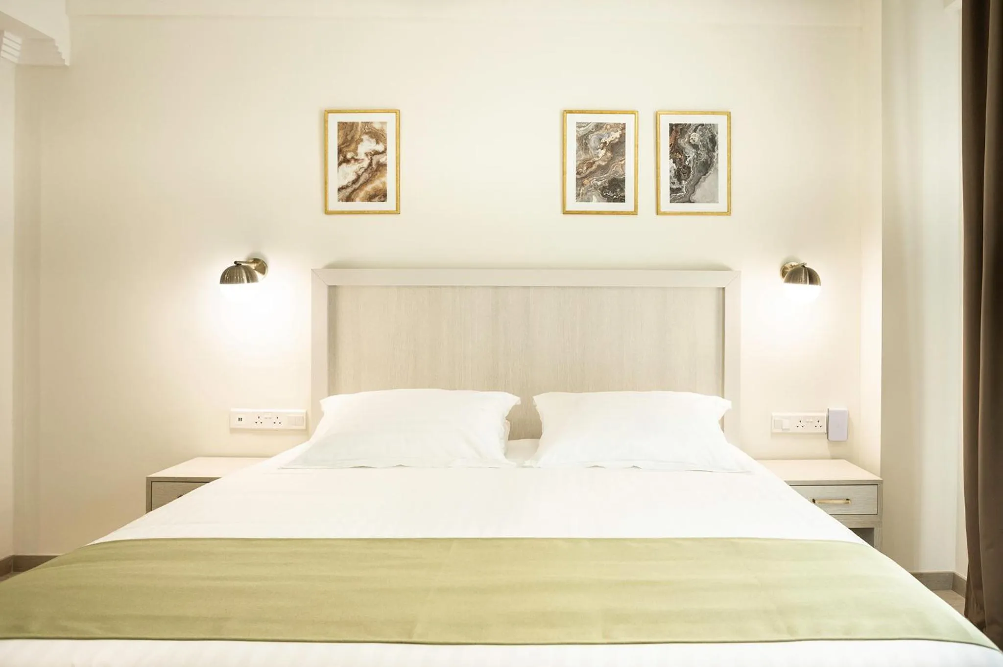 Bed in Roseum Boutique Hotel