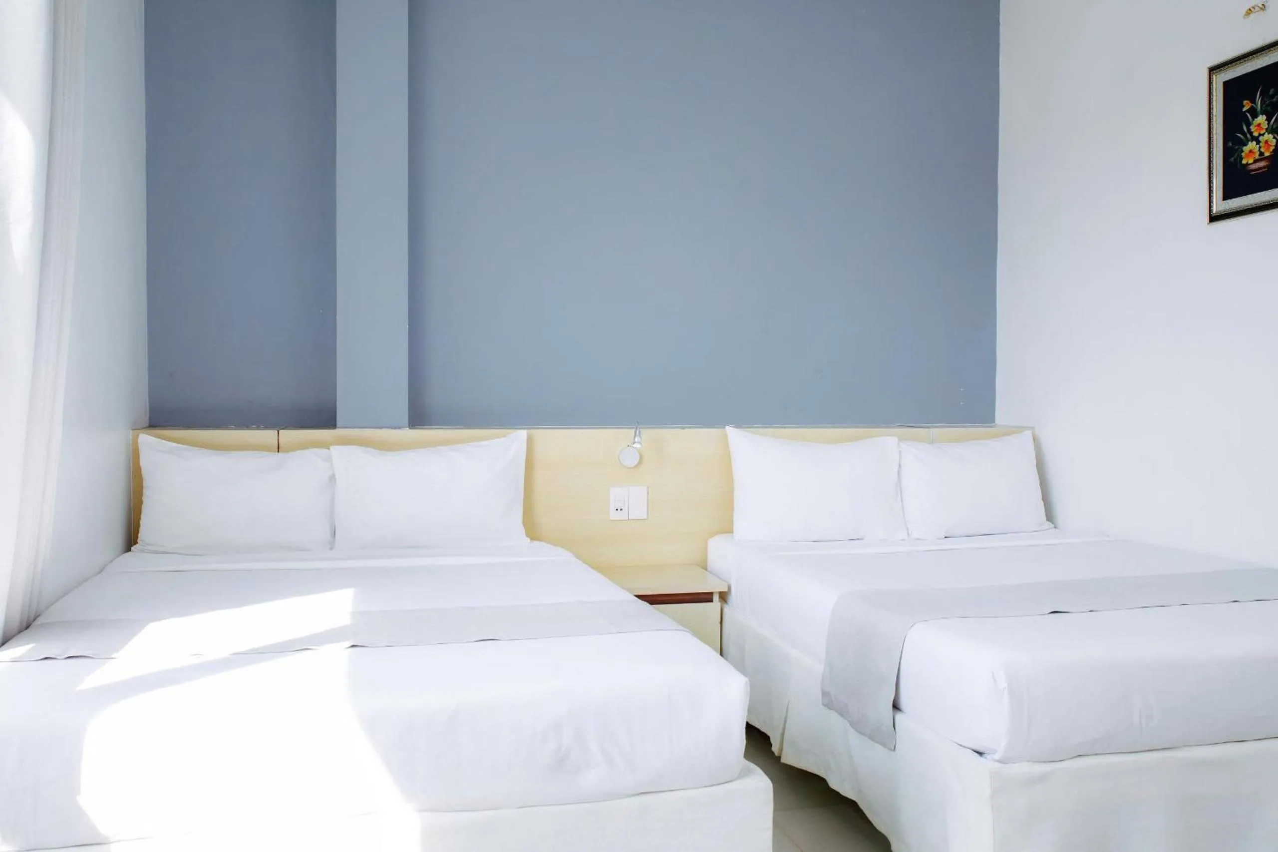 Bed in Ngoc Nguyen Anh Hotel Da Lat