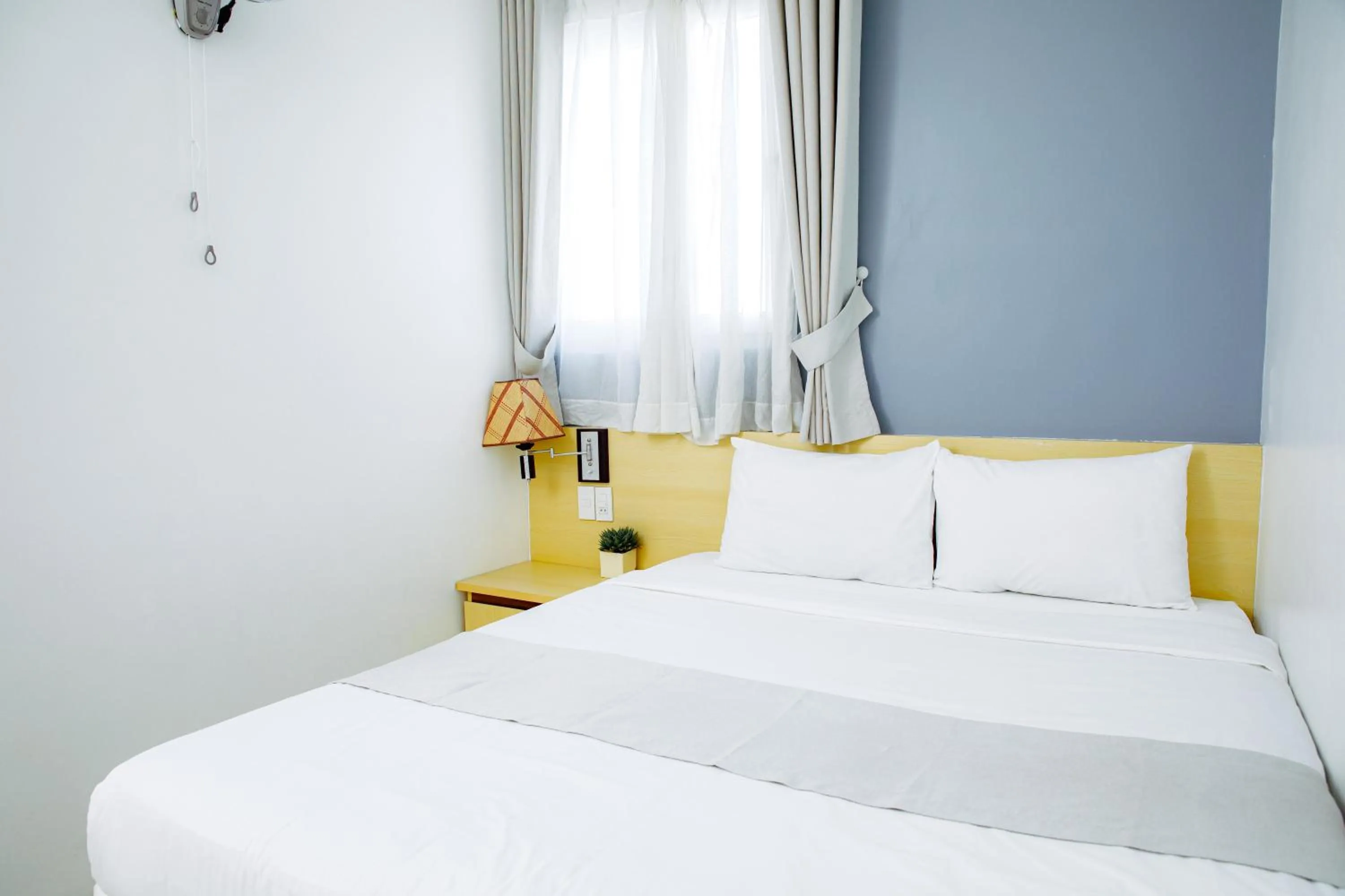 Bed in Ngoc Nguyen Anh Hotel Da Lat