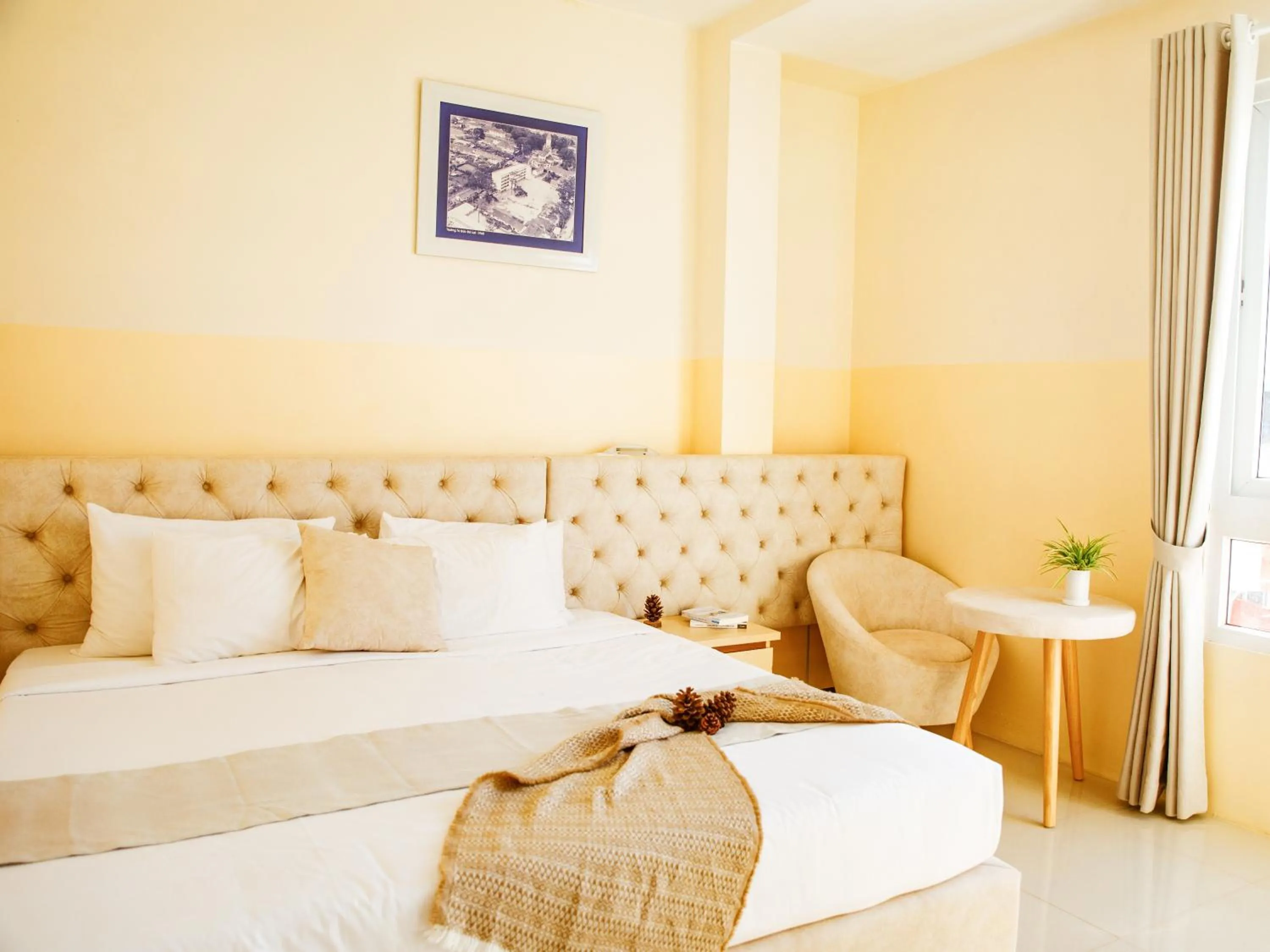 Photo of the whole room, Bed in Ngoc Nguyen Anh Hotel Da Lat