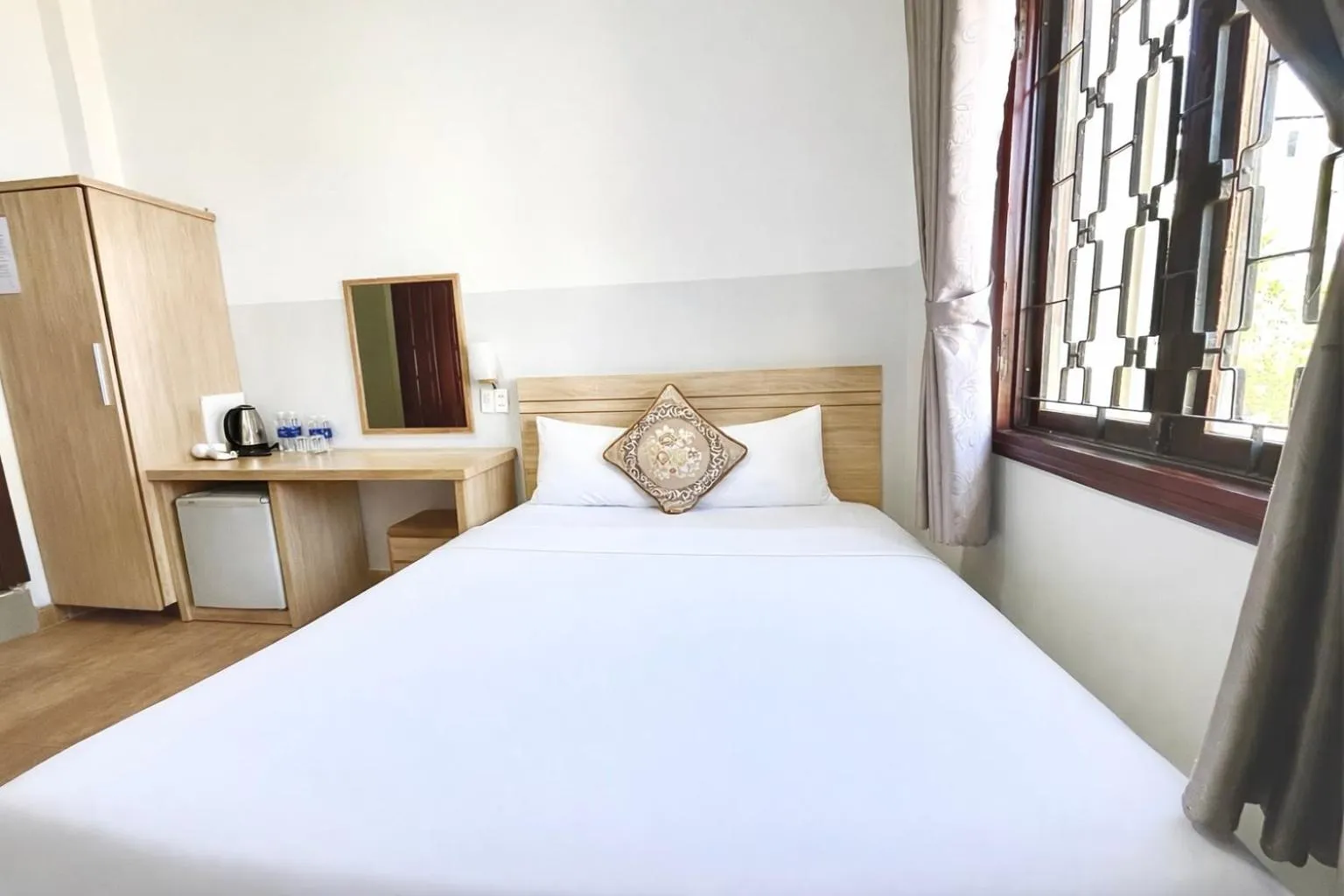 Bed in Ngoc Nguyen Anh Hotel Da Lat