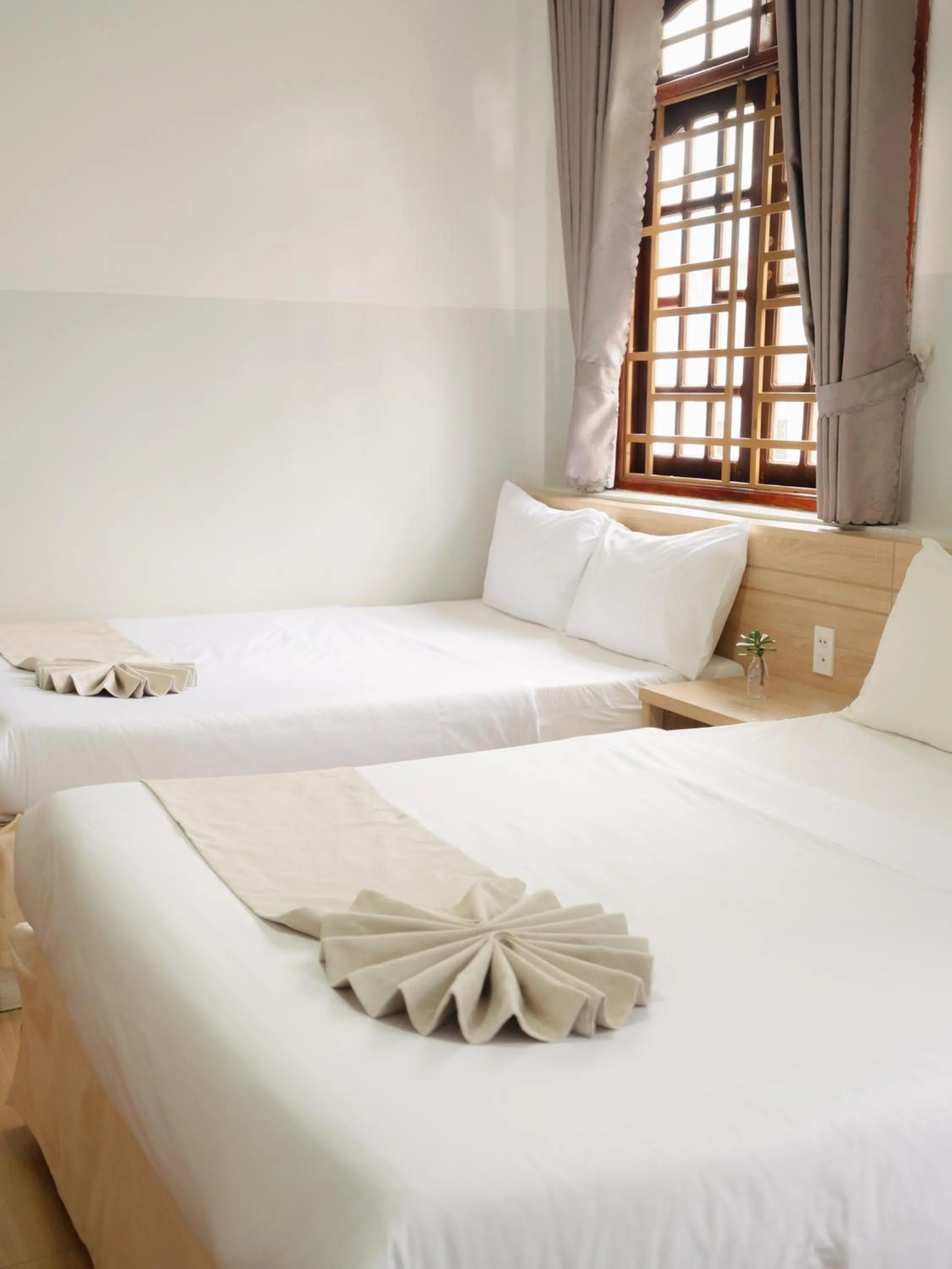 Bed in Ngoc Nguyen Anh Hotel Da Lat