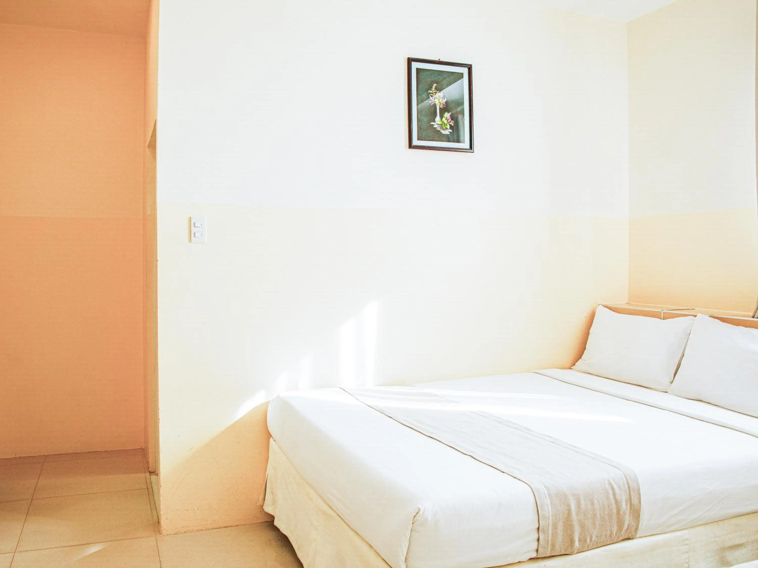 Bed in Ngoc Nguyen Anh Hotel Da Lat