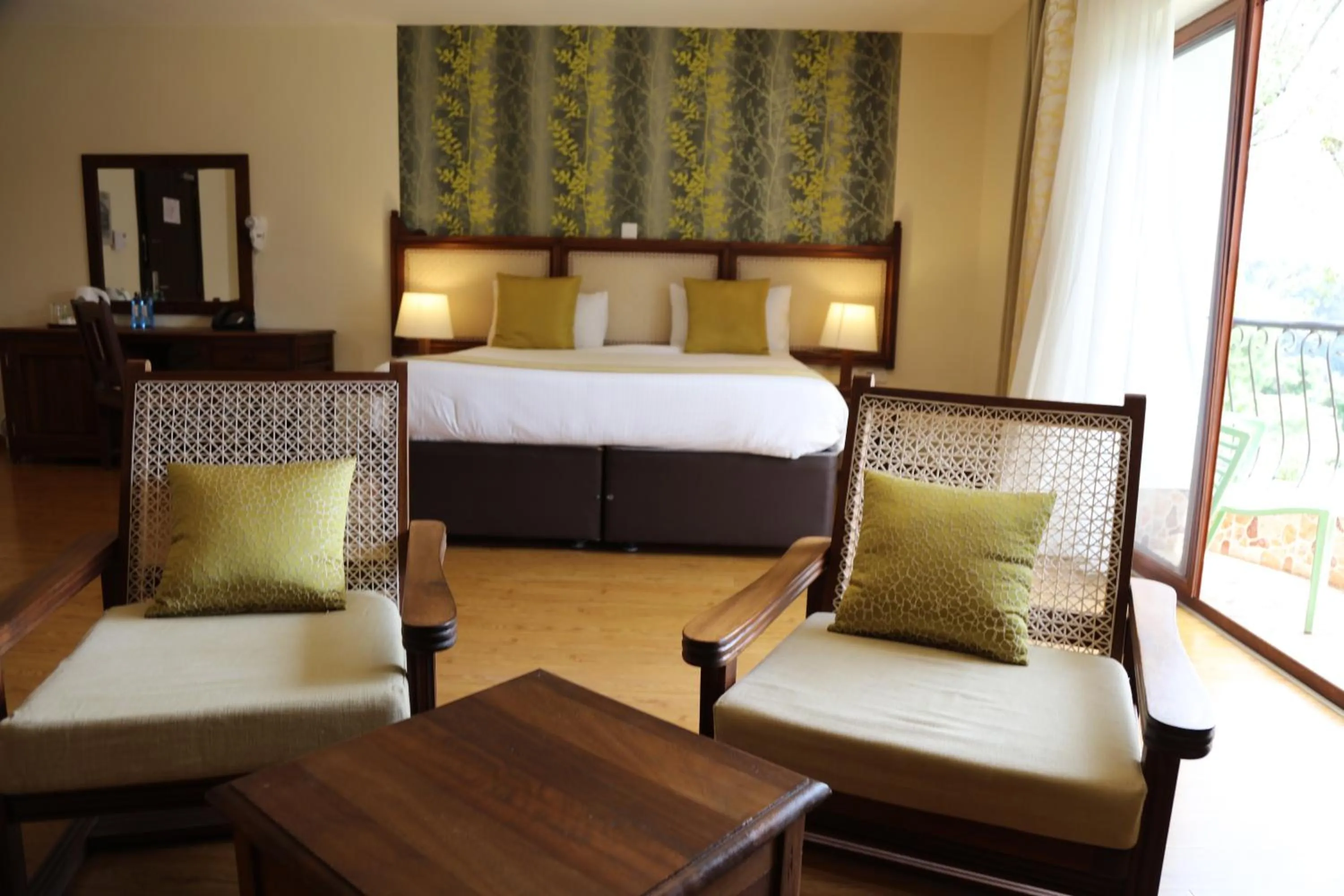 Seating area, Bed in Panari Resort, BW Signature Collection