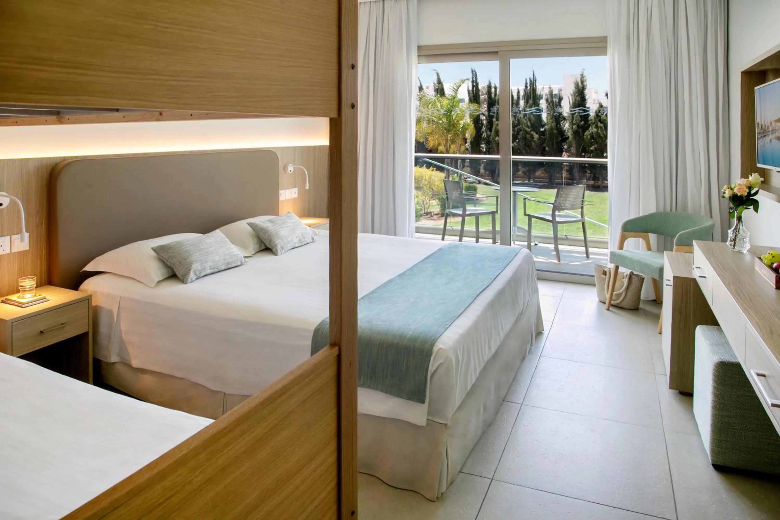 Bed in Asterias Beach Hotel