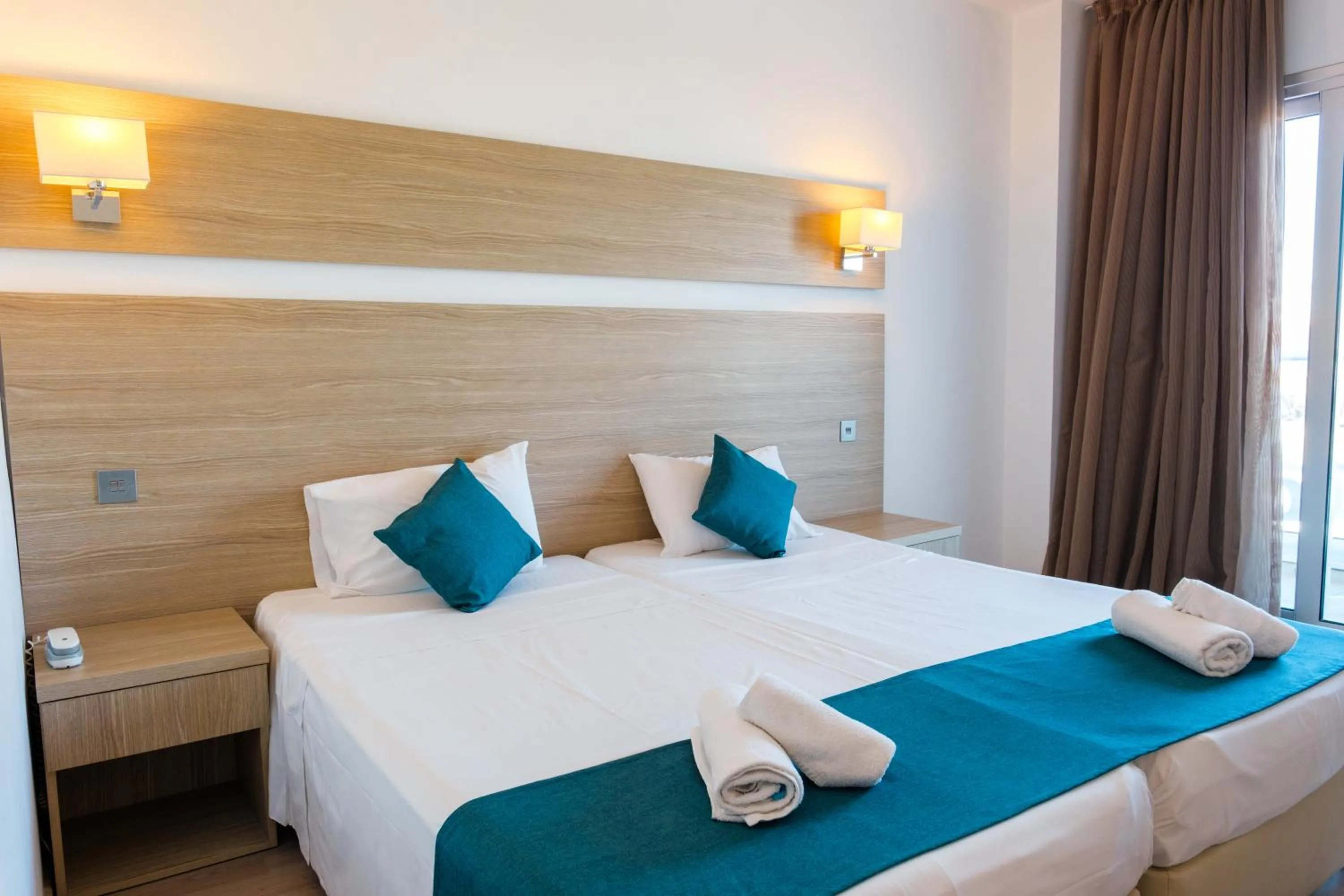 Bed in Kapetanios Bay Hotel Protaras