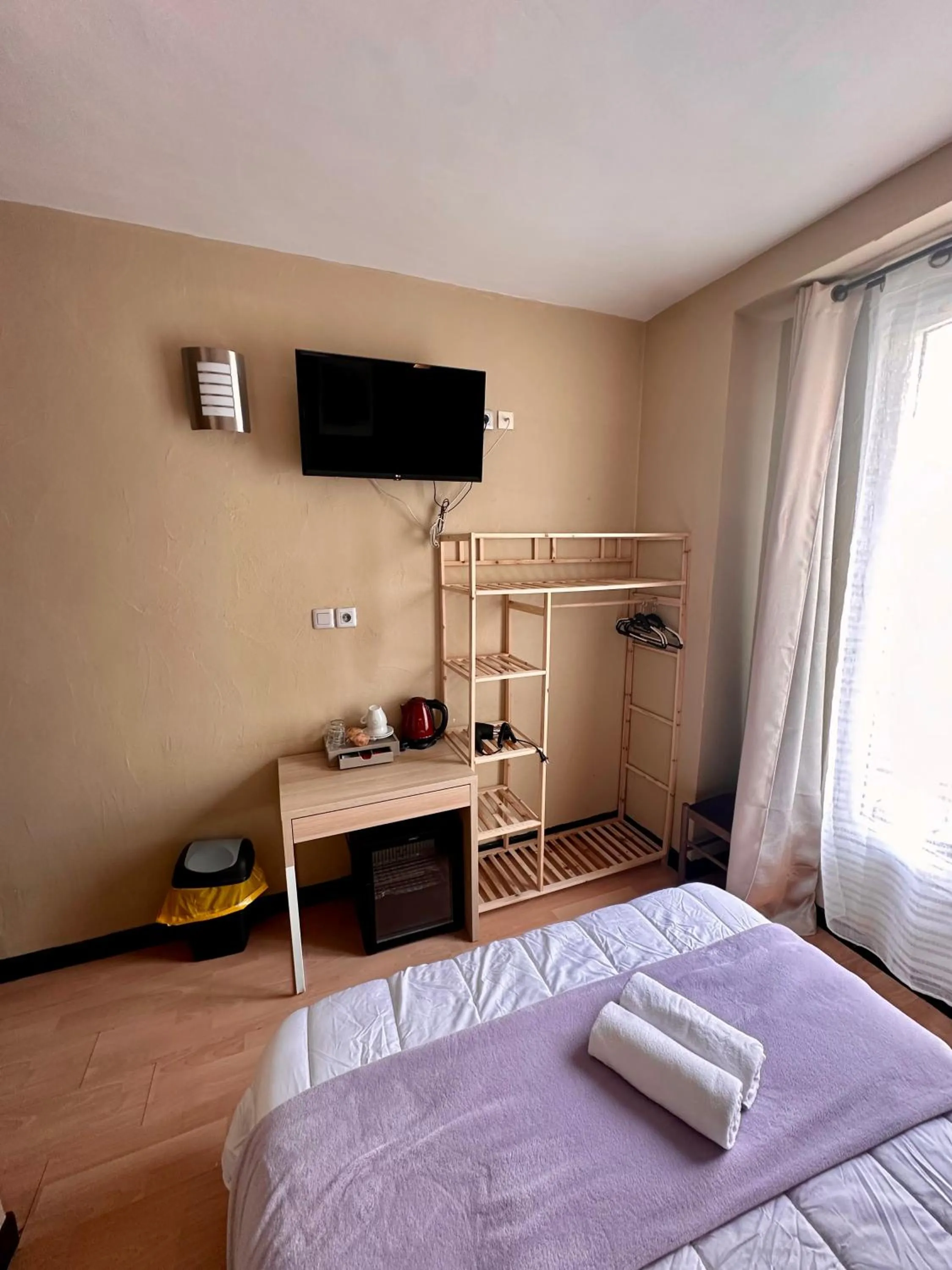 Bed in Hotel Victor Hugo