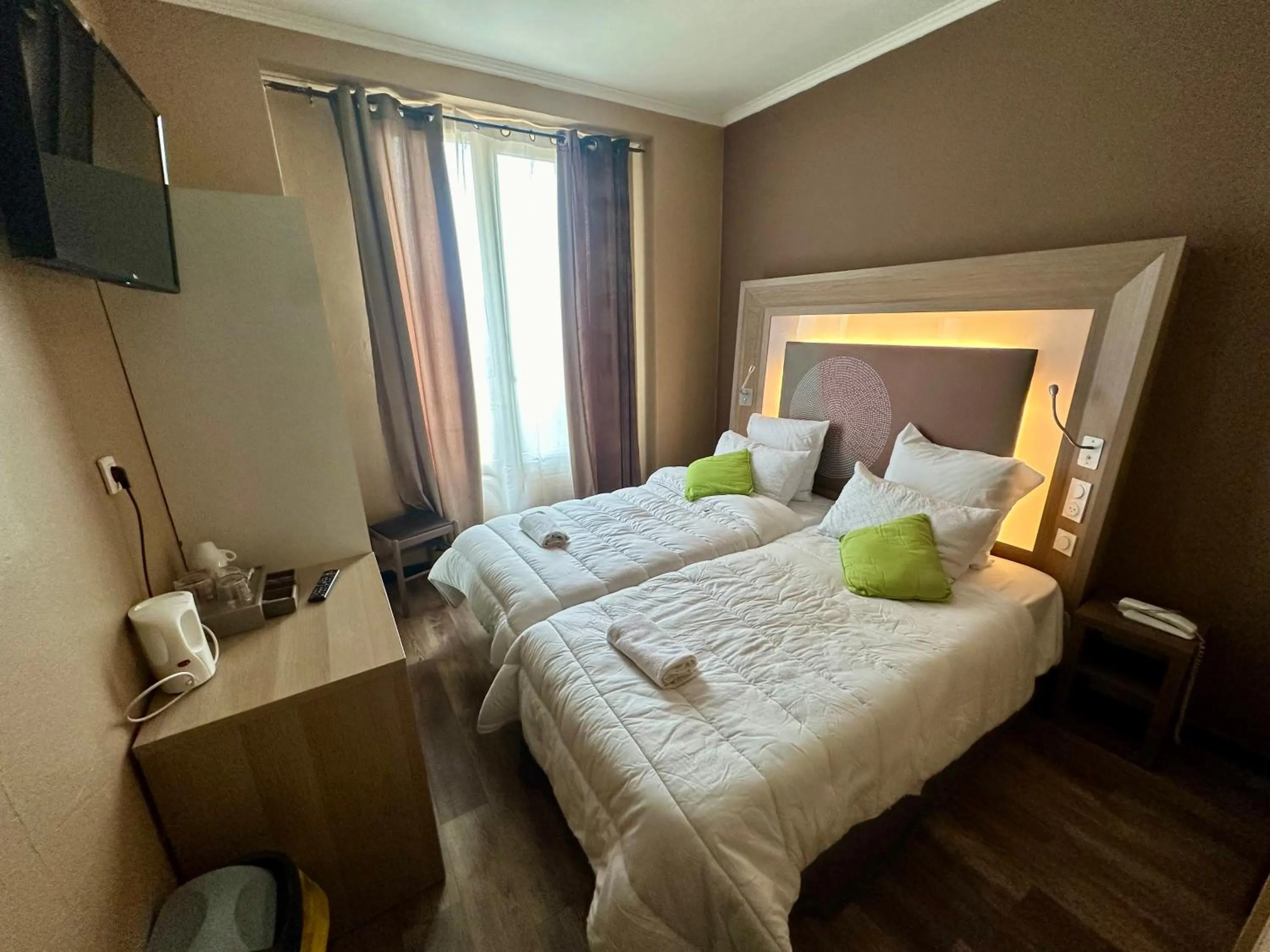 Bed in Hotel Victor Hugo