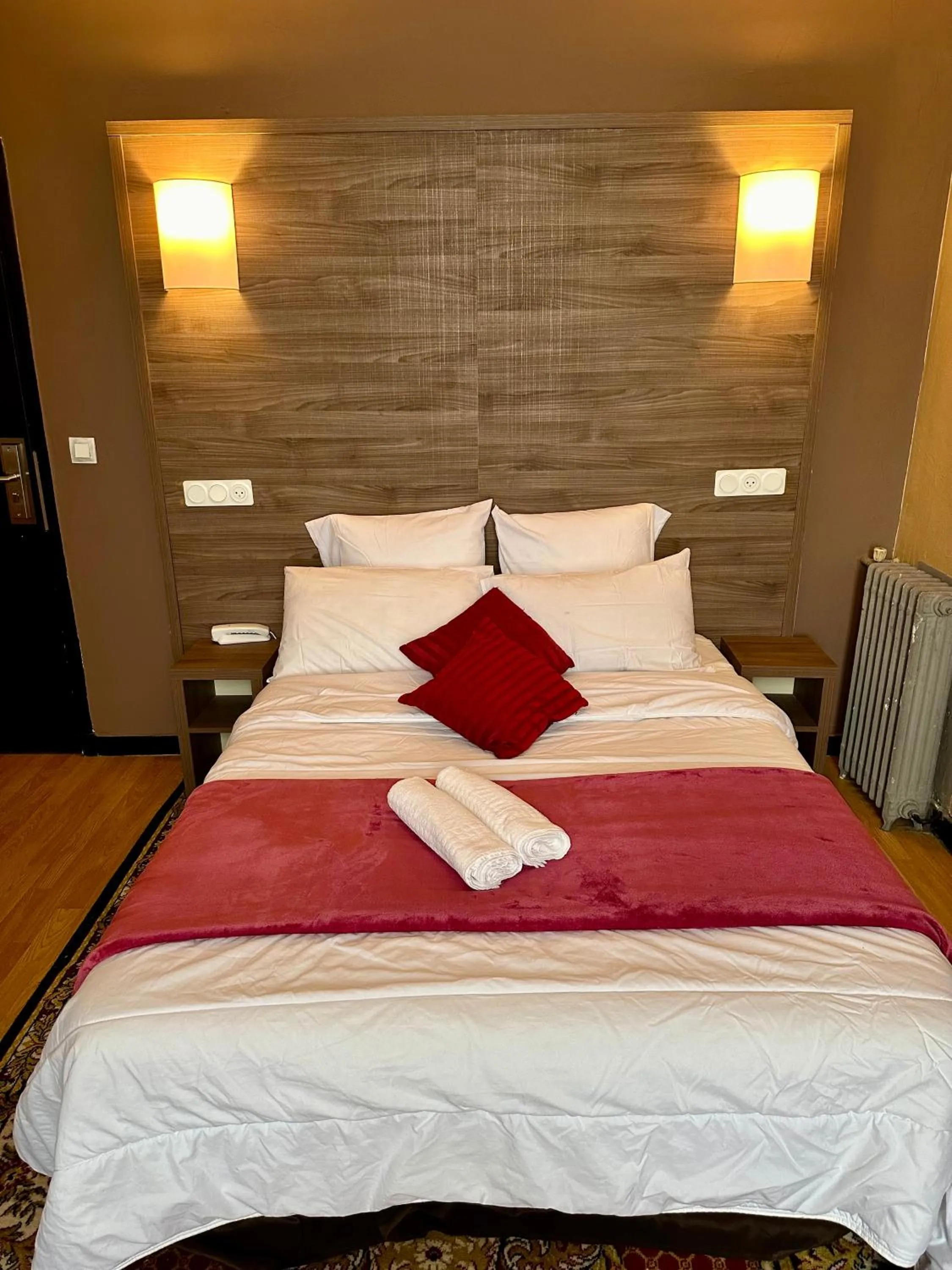 Bed in Hotel Victor Hugo