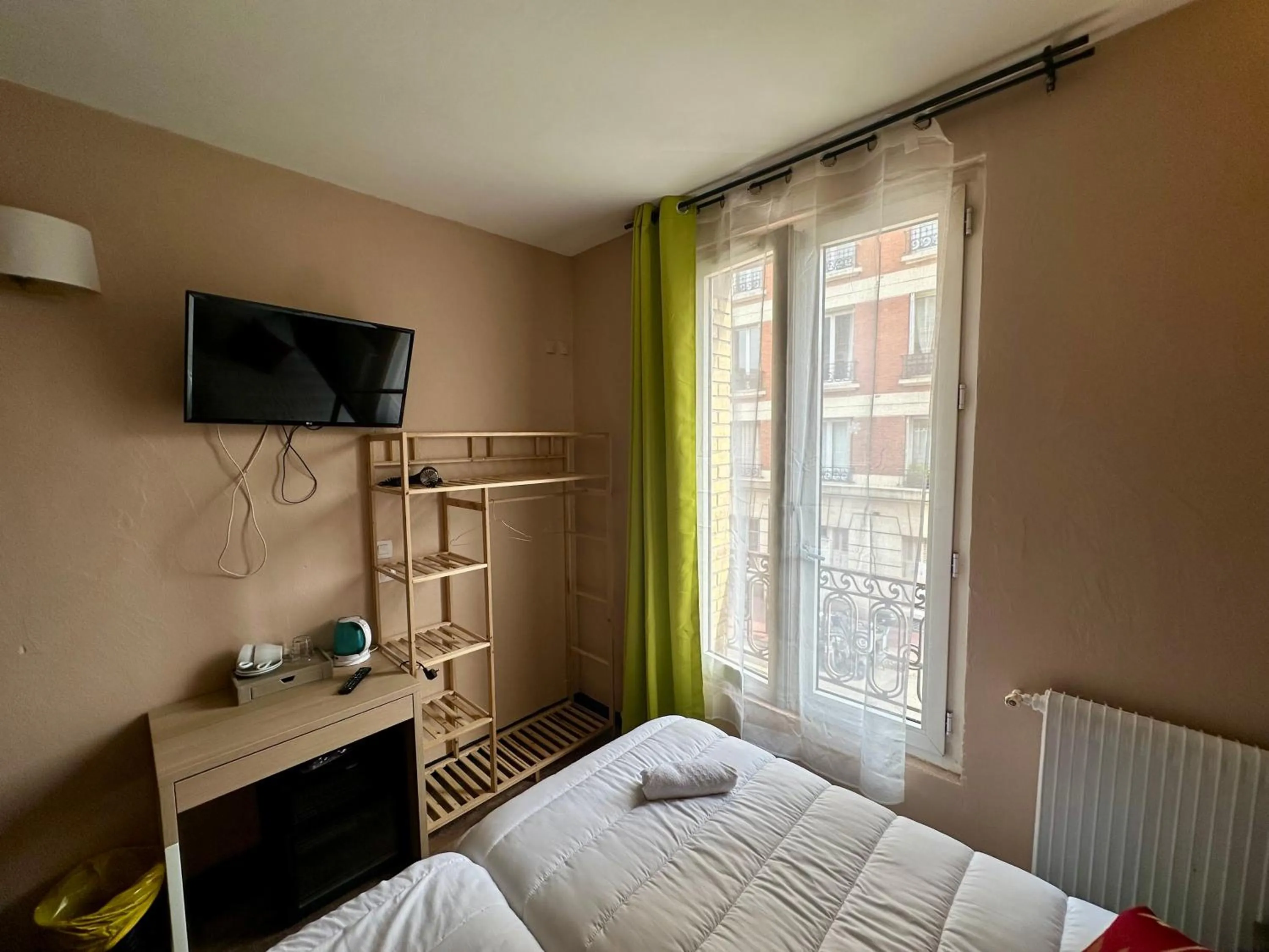 Bed in Hotel Victor Hugo