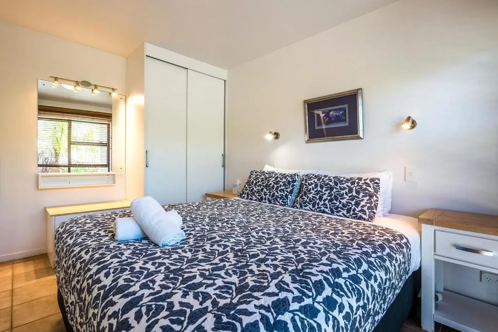 Bed in Onetangi Beach Apartments