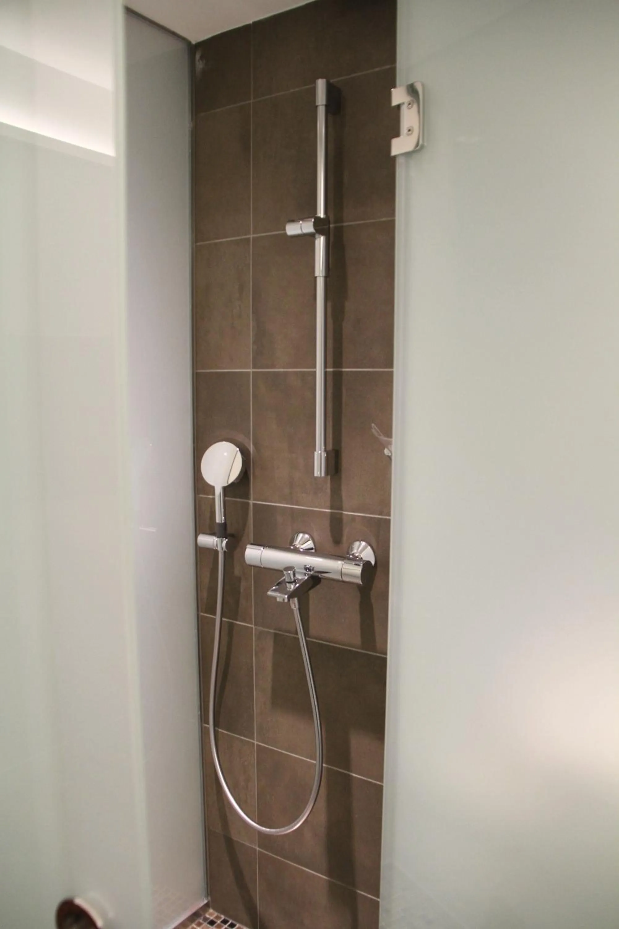 Shower in Comfort Hotel Xpress Helsinki Airport Terminal