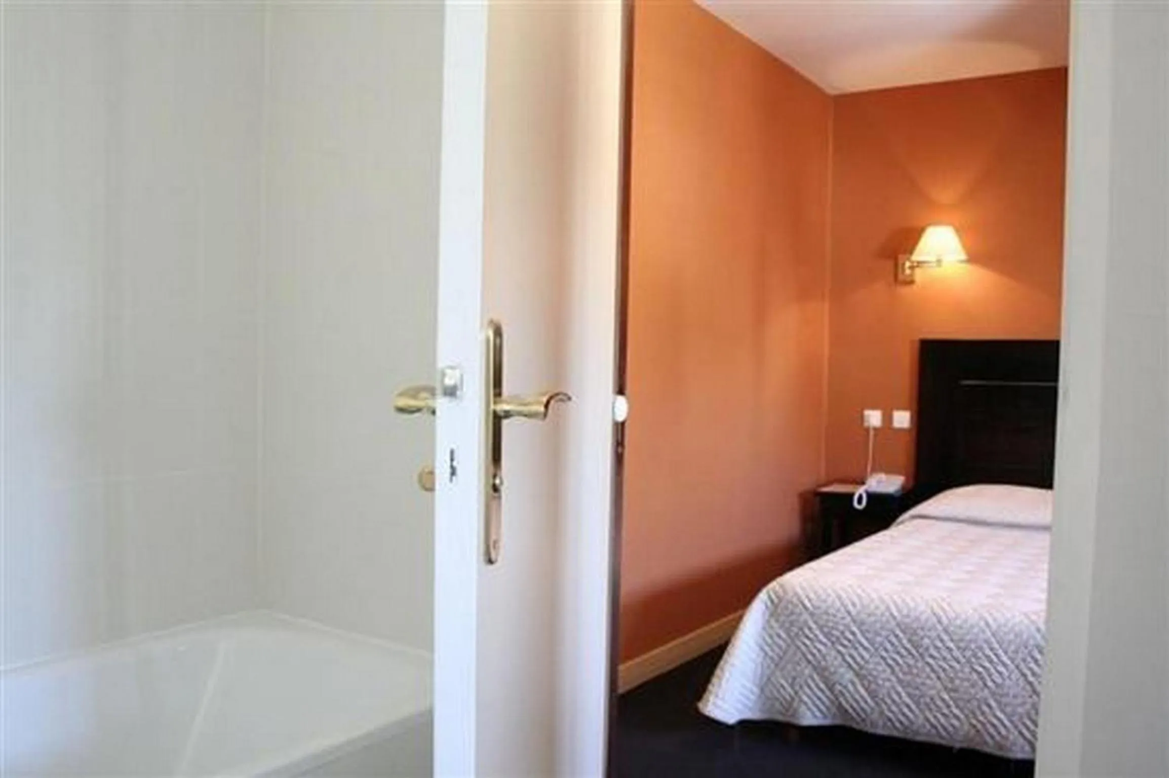 Bed in Hôtel Ariane & SPA