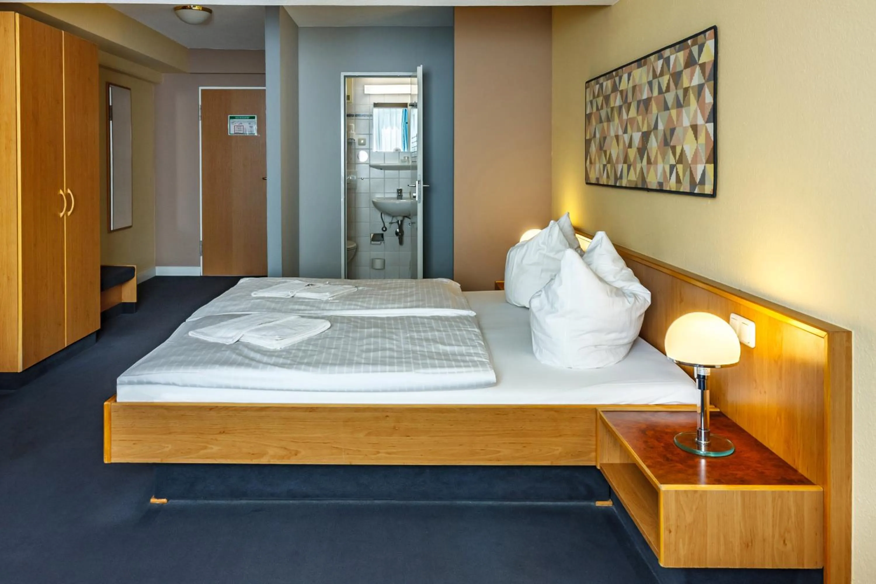 Bed in City-Pension Dessau-Roßlau