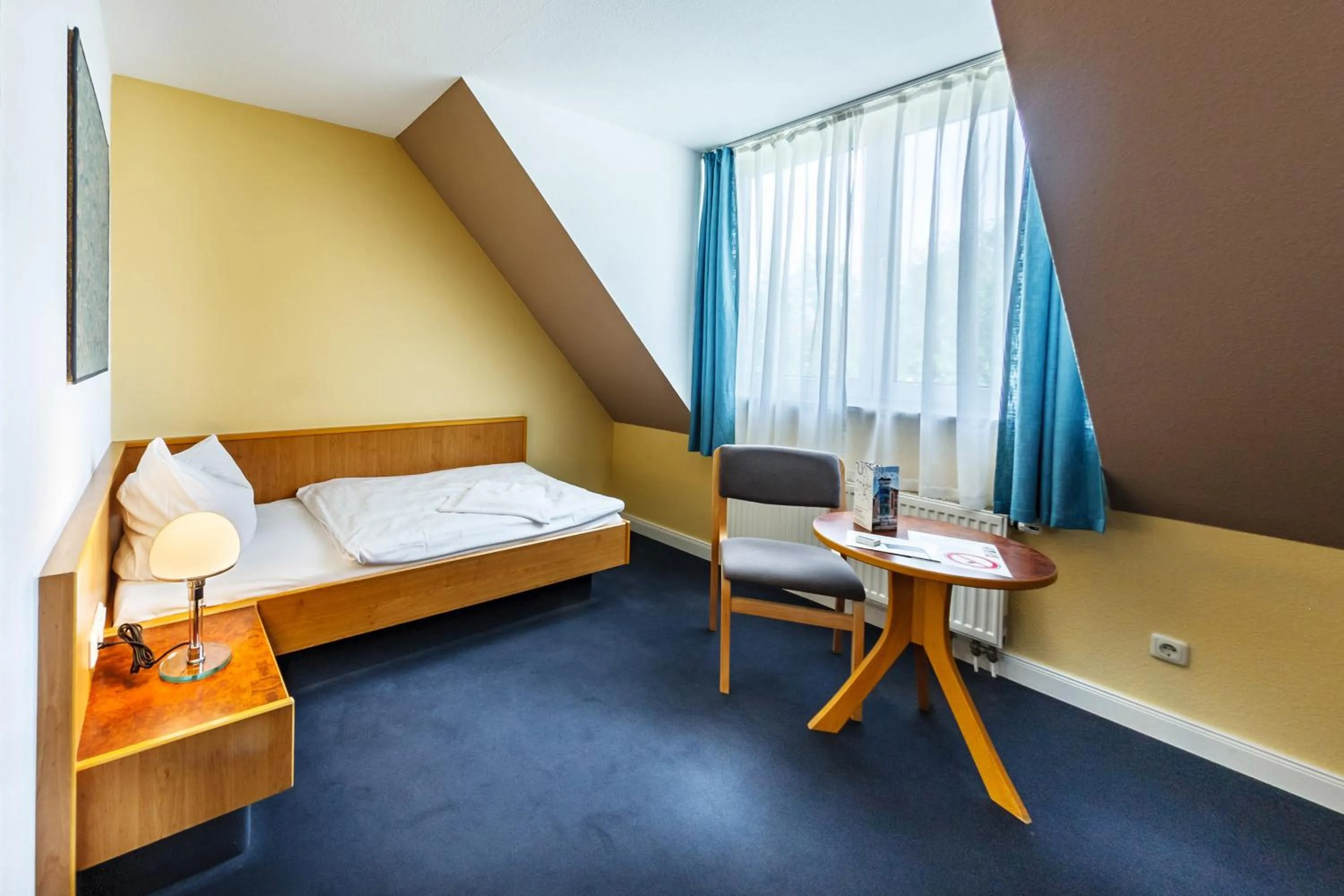 Photo of the whole room, Bed in City-Pension Dessau-Roßlau