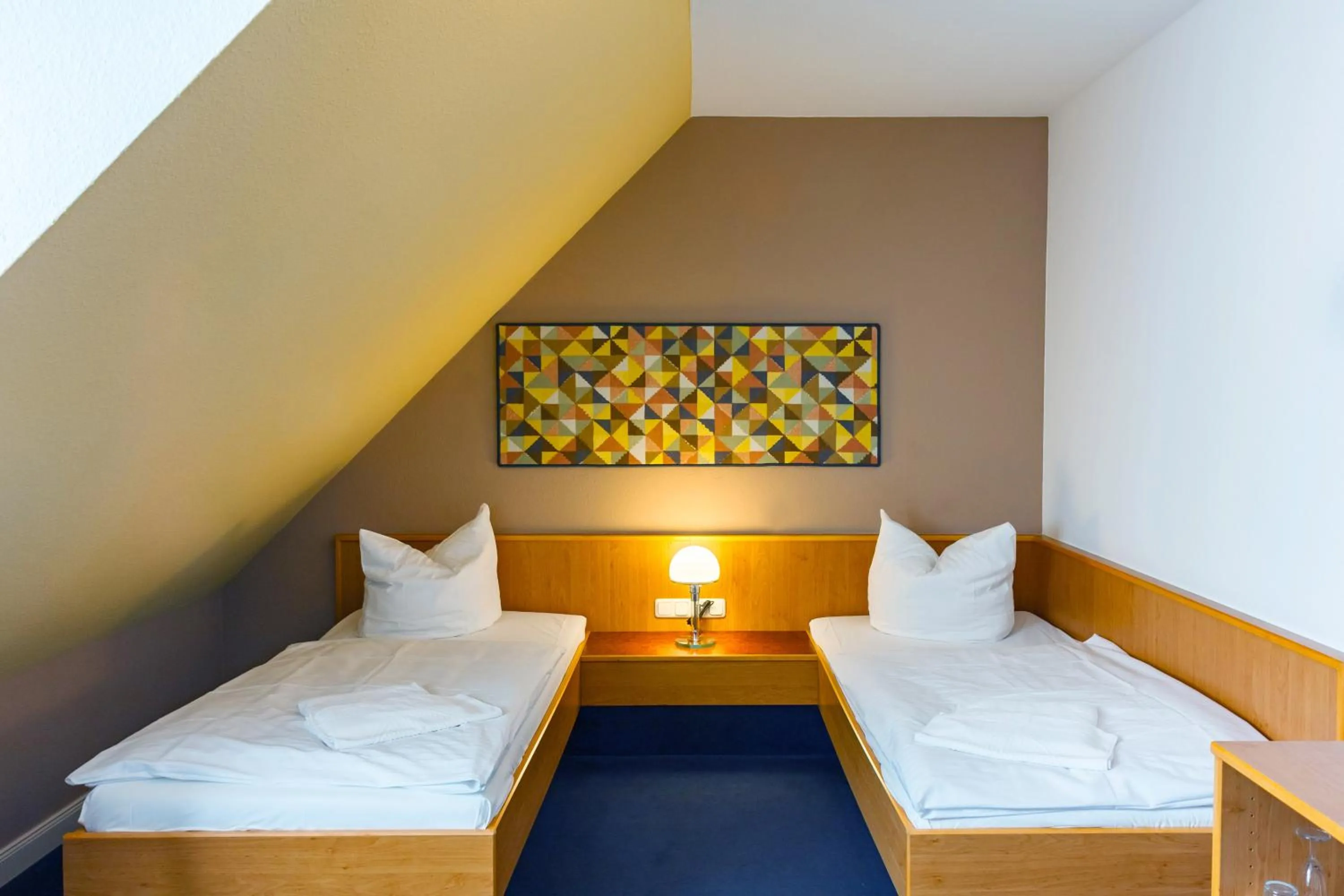 Photo of the whole room, Bed in City-Pension Dessau-Roßlau