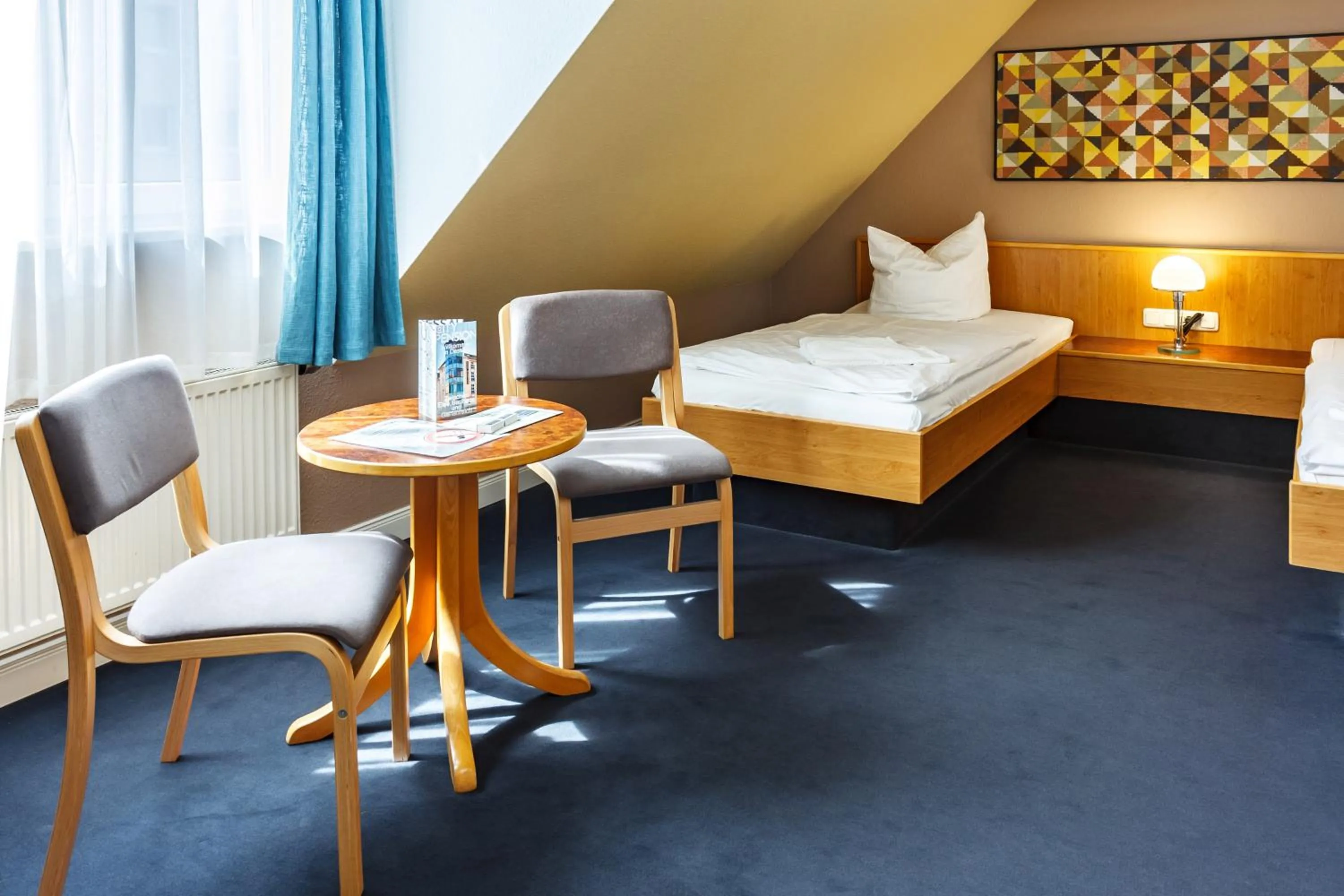 Photo of the whole room, Bed in City-Pension Dessau-Roßlau