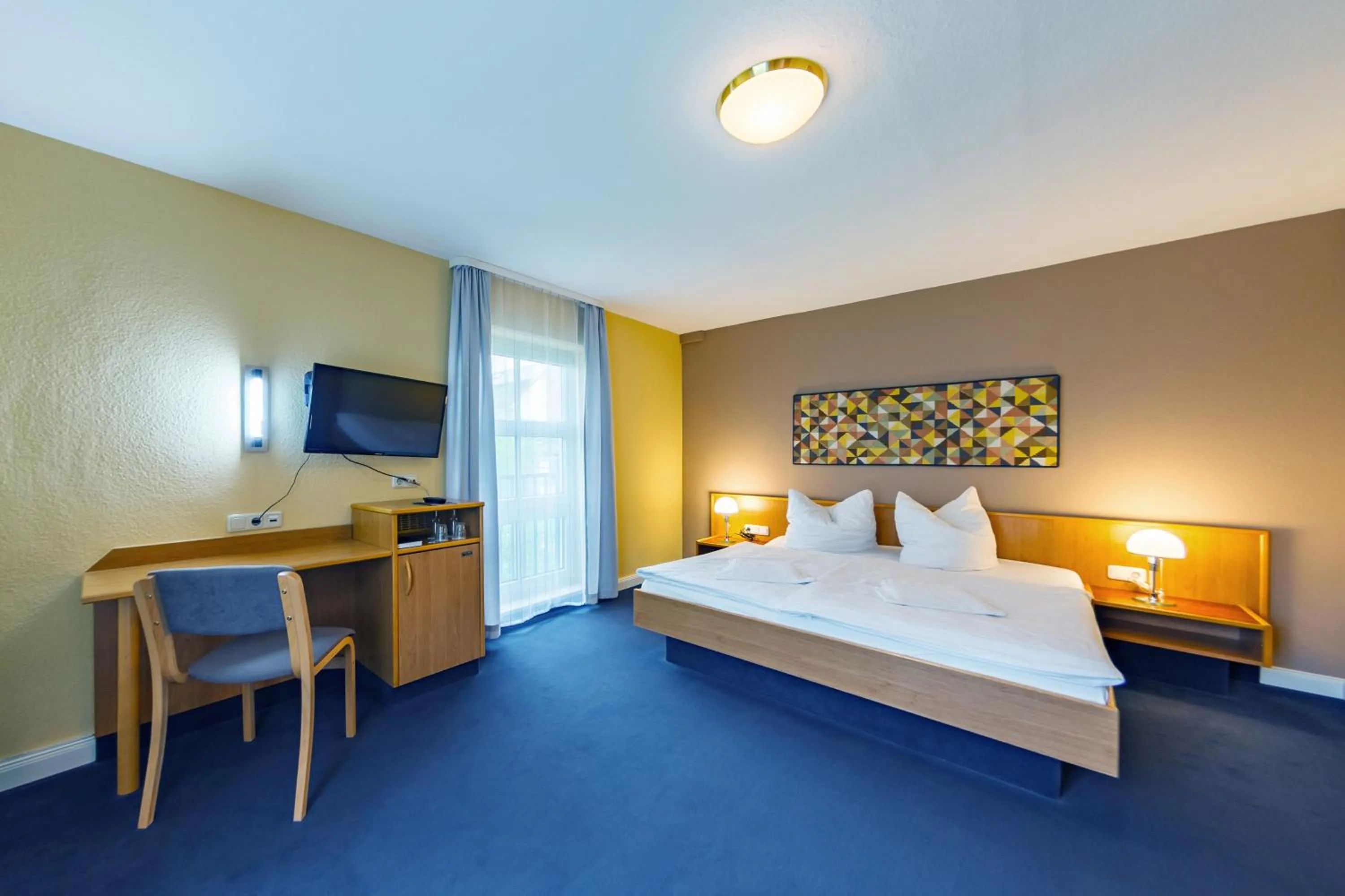 Photo of the whole room, Bed in City-Pension Dessau-Roßlau