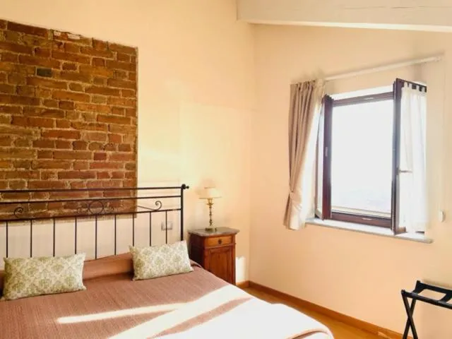 Bed in Relais Palazzo Paleologi Sec.XIV