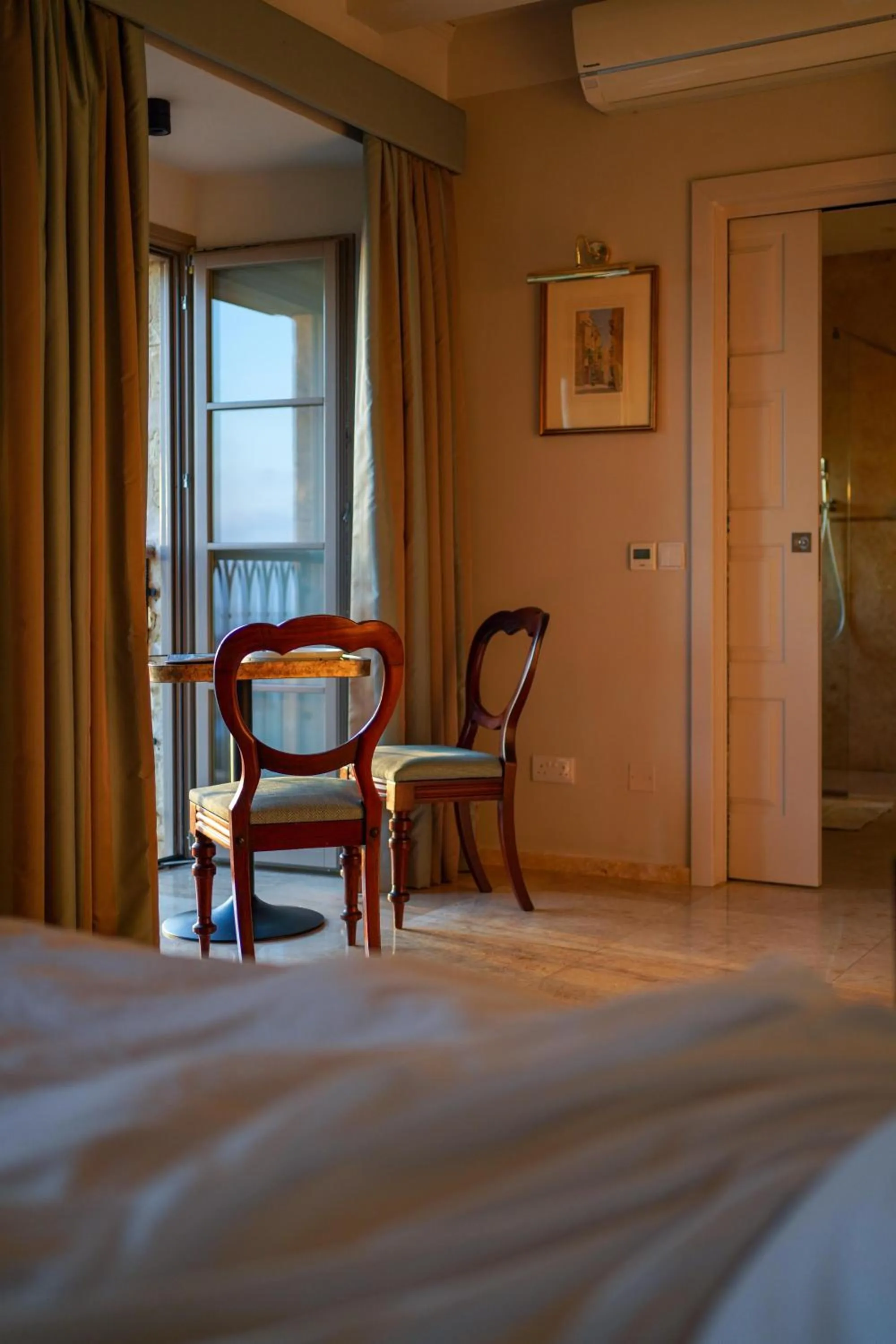 Seating area, Bed in The Xara Palace Relais & Chateaux