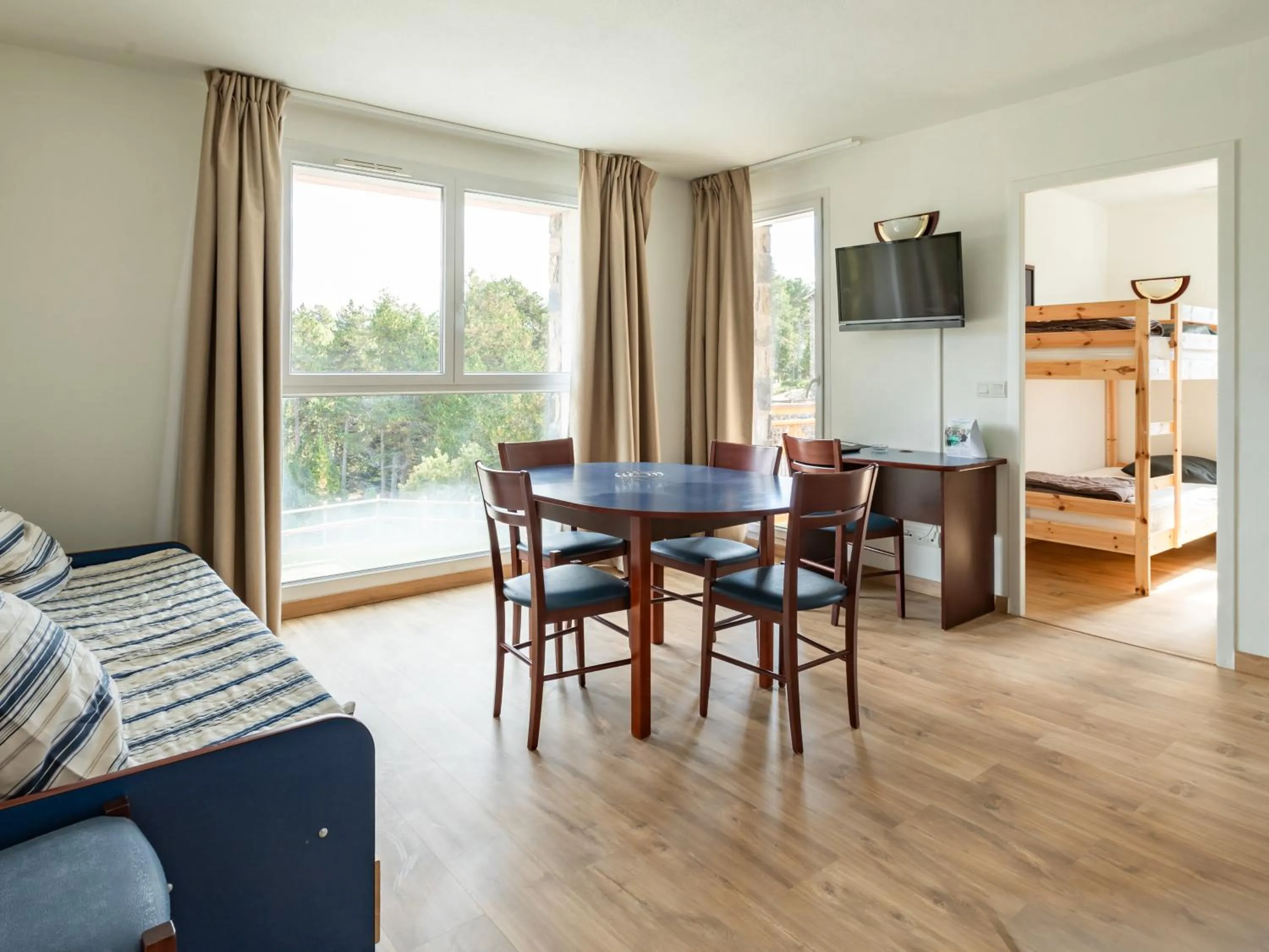 Living room in Vacancéole - Appart'Vacances Pyrénées 2000