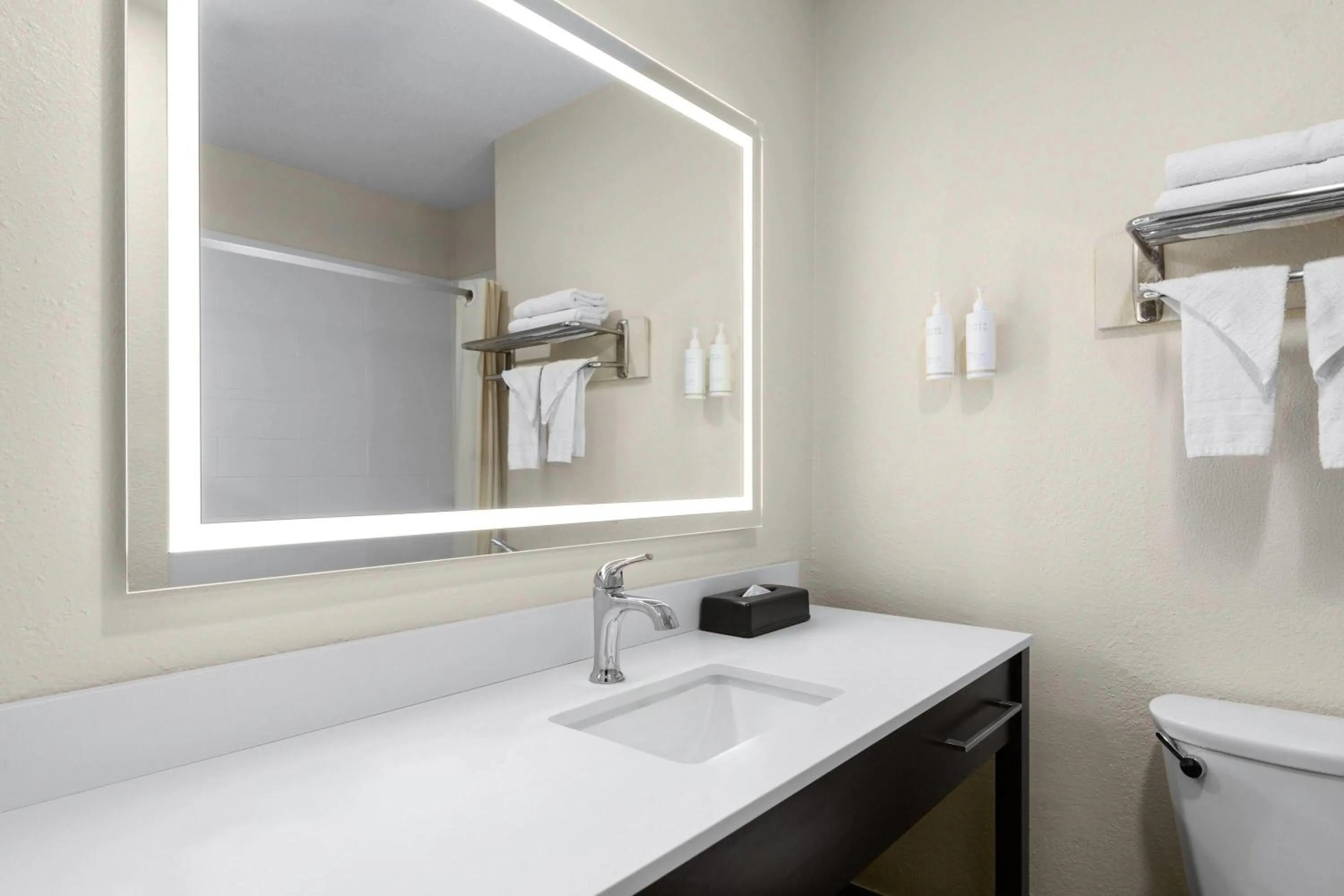 Bathroom in Super 8 by Wyndham New Orleans