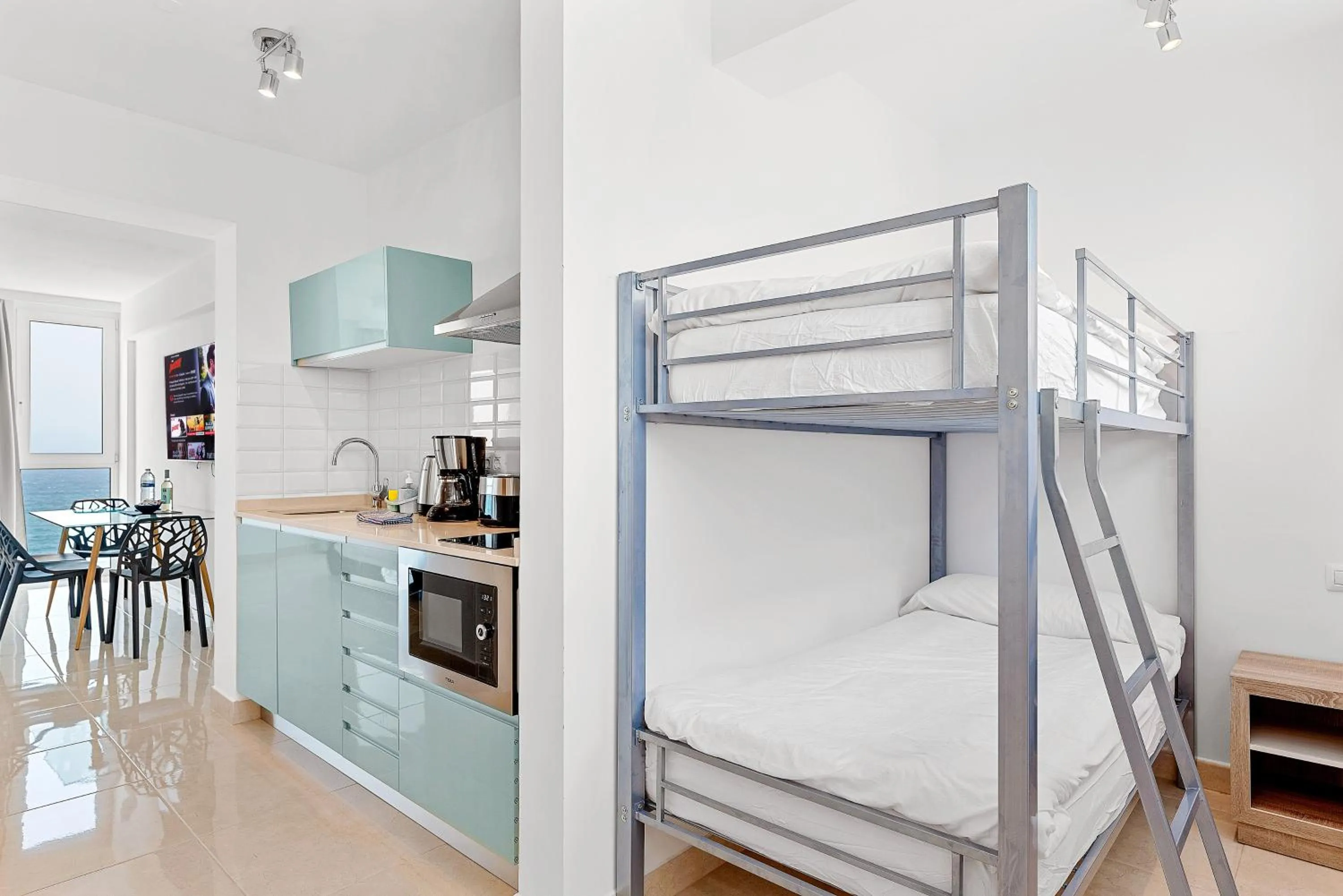 Dining area, Bed in Ocean Vistas 24