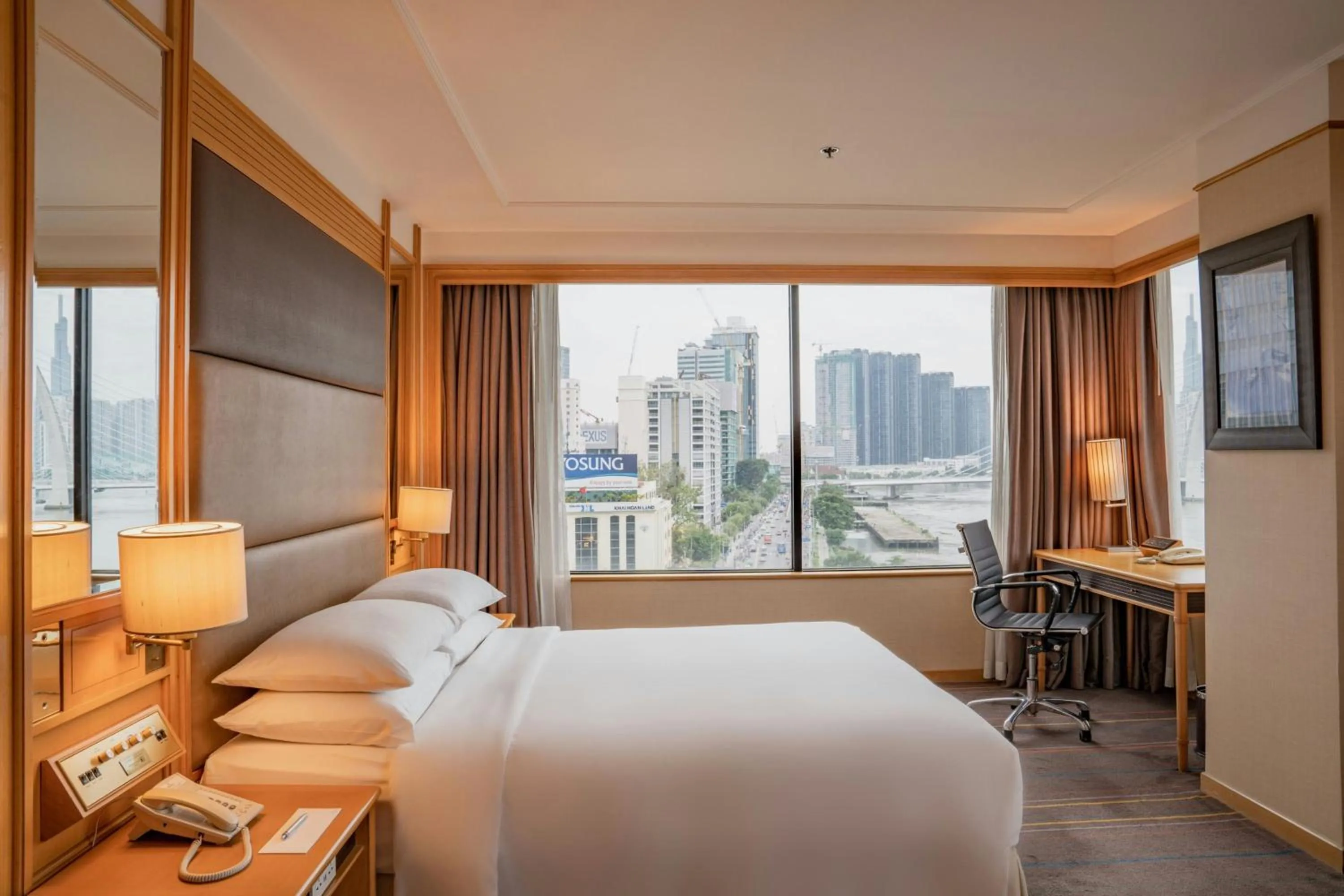 Photo of the whole room, Bed in Renaissance Riverside Hotel Saigon