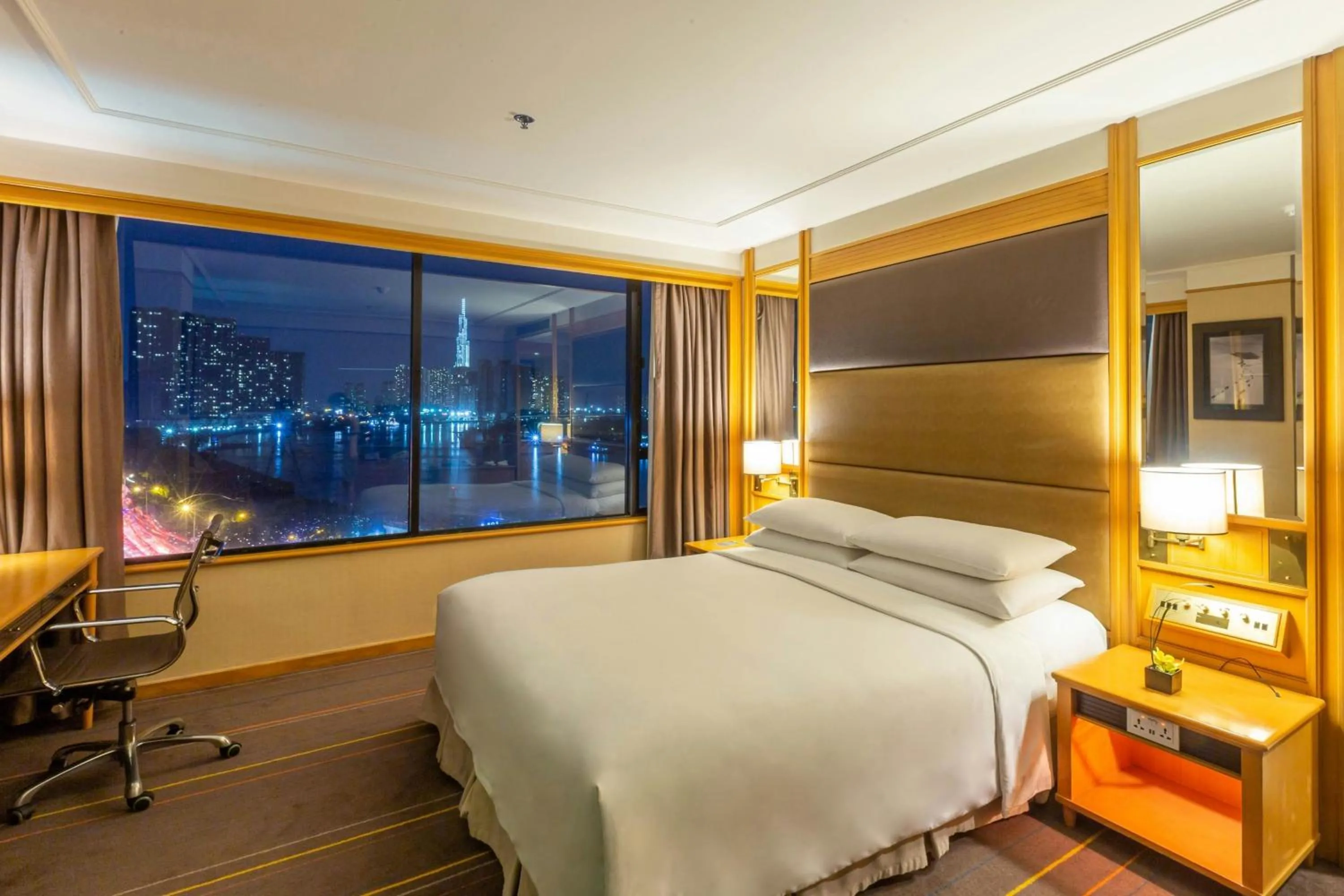 Photo of the whole room, Bed in Renaissance Riverside Hotel Saigon