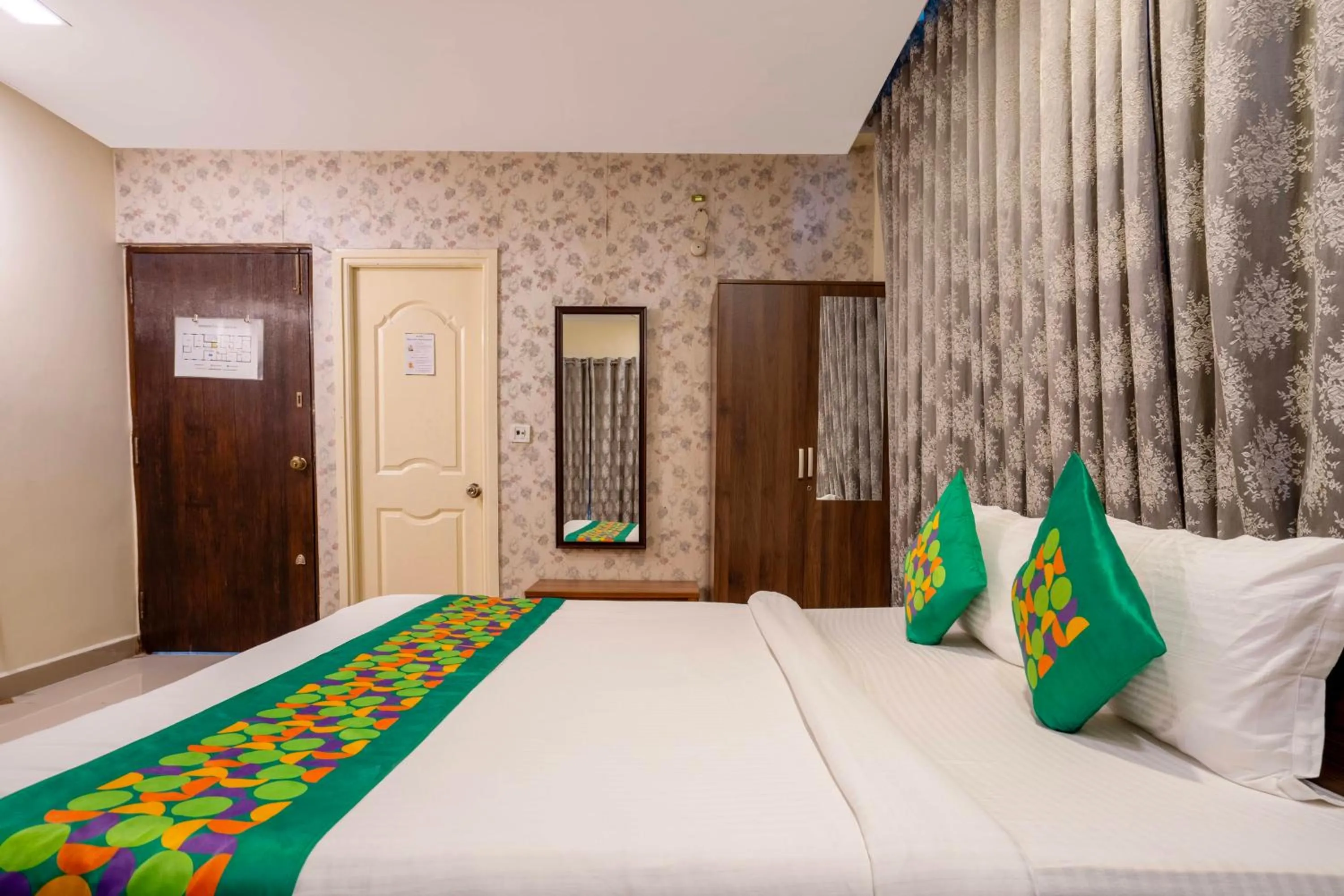 Bedroom, Bed in Treebo Srico, Banjara Hills