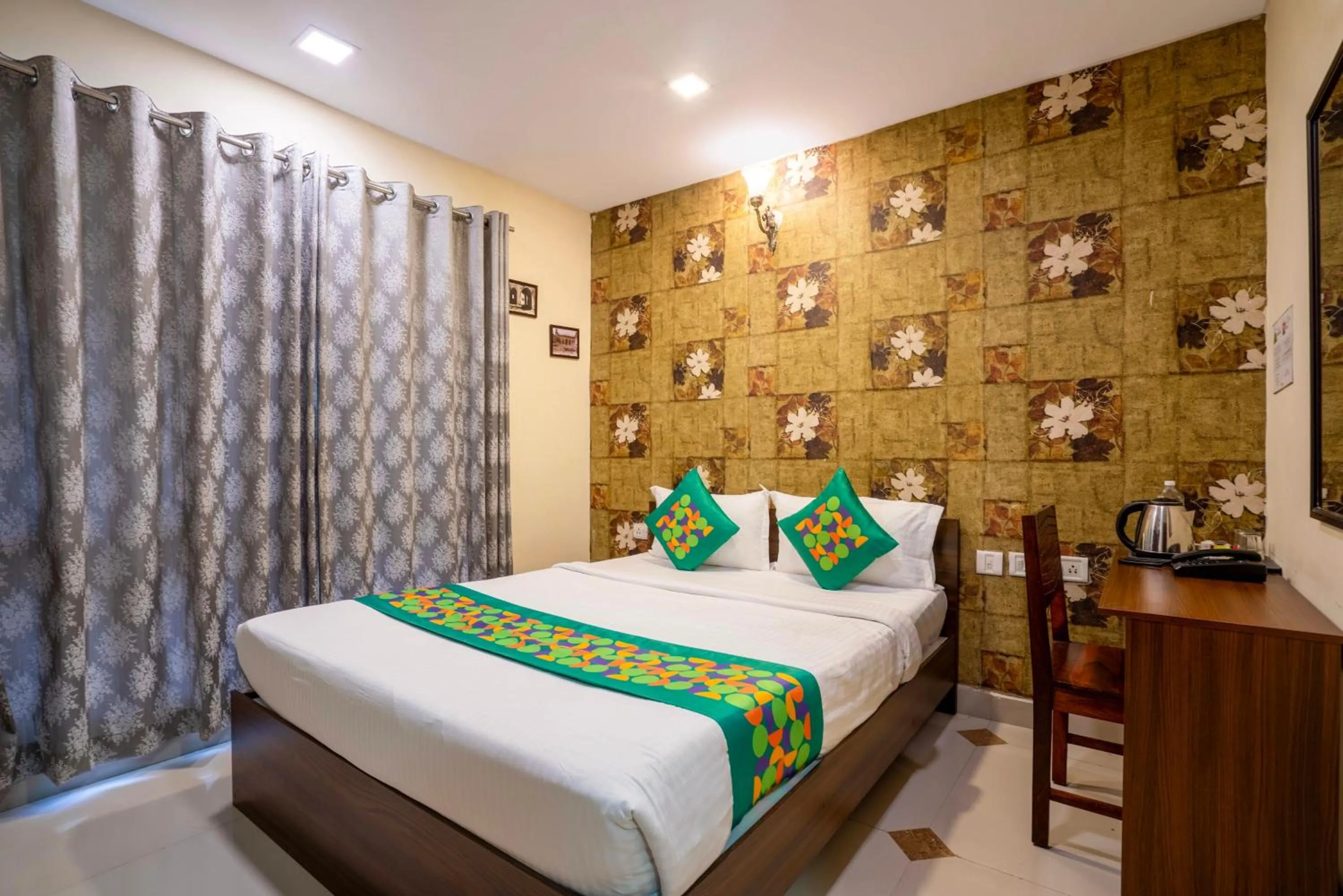 Bedroom, Bed in Treebo Srico, Banjara Hills