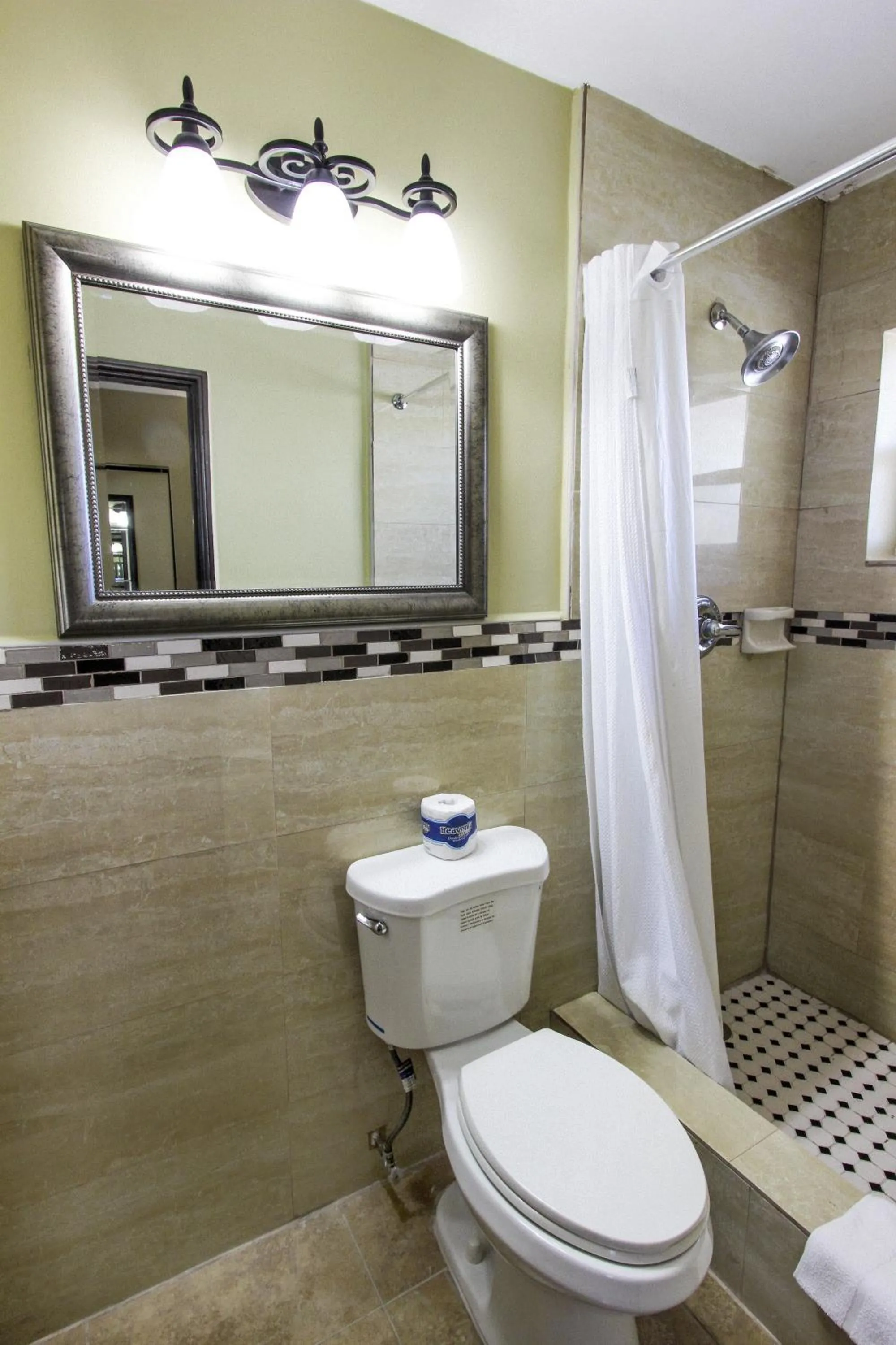 Bathroom in Oceans Beach Resort & Suites