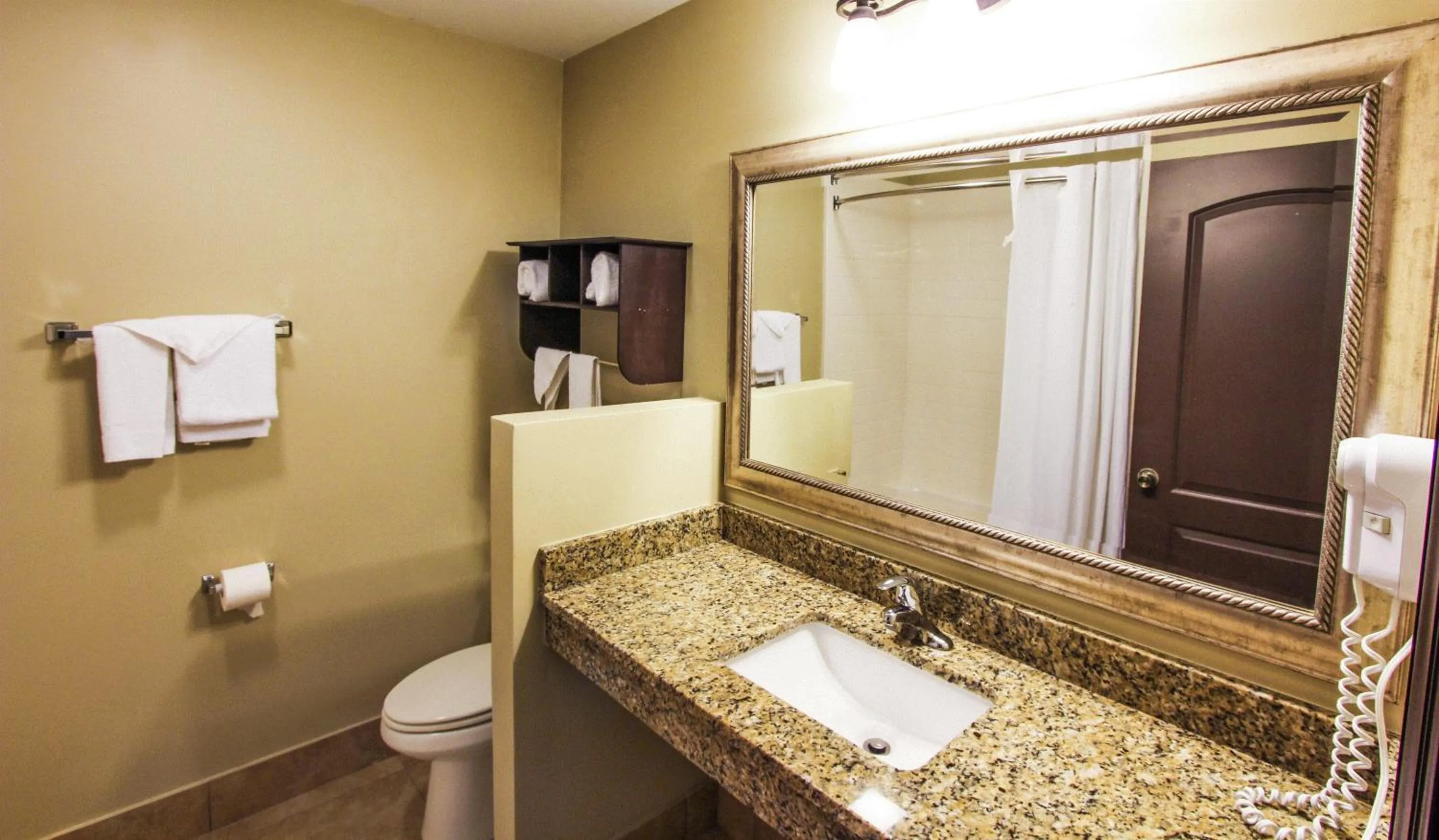 Bathroom in Oceans Beach Resort & Suites