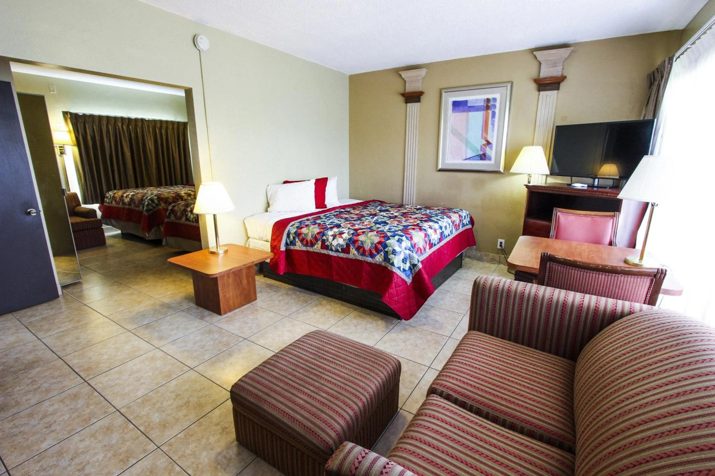 Bedroom, Bed in Oceans Beach Resort & Suites