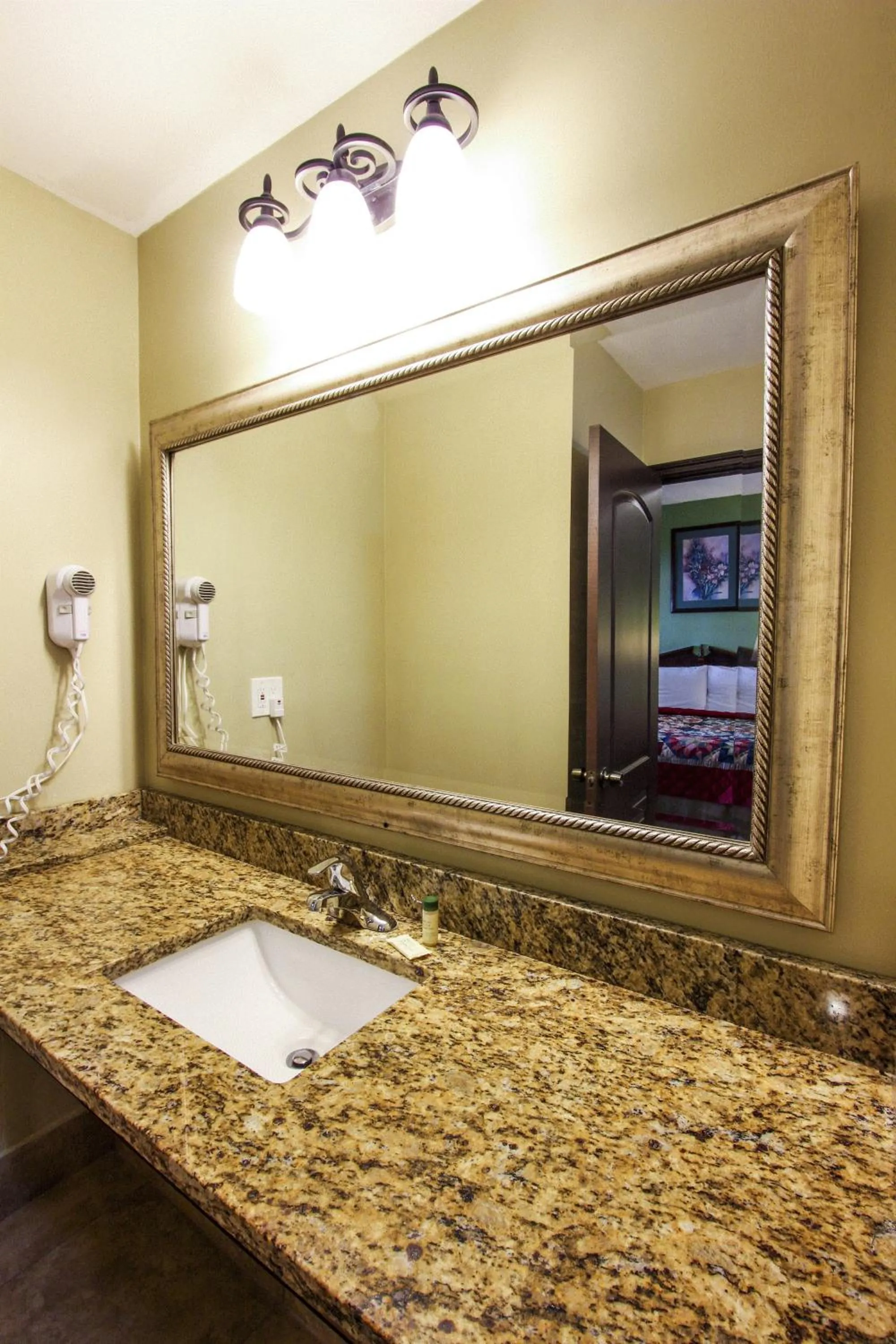 Bathroom in Oceans Beach Resort & Suites