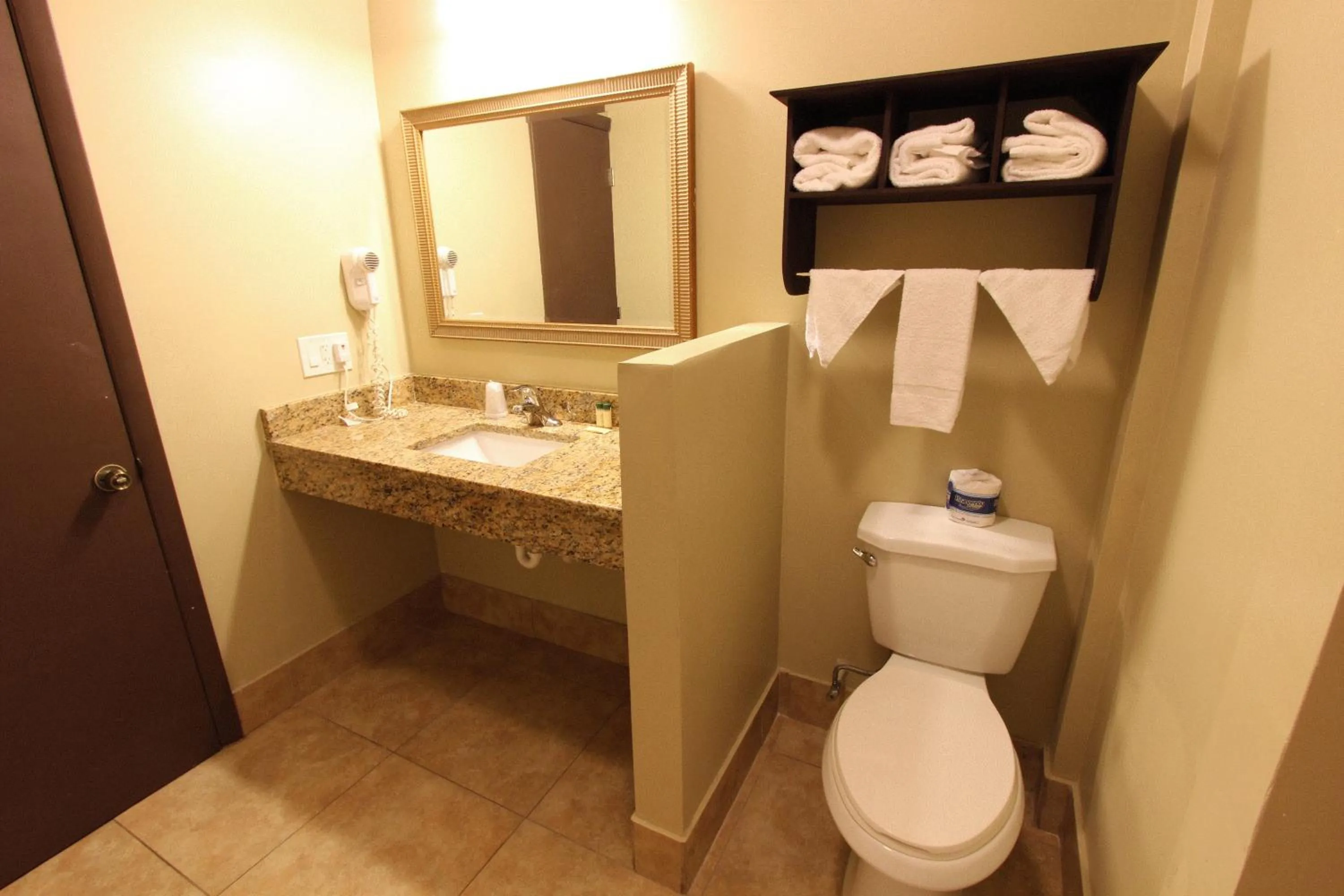 Bathroom in Oceans Beach Resort & Suites