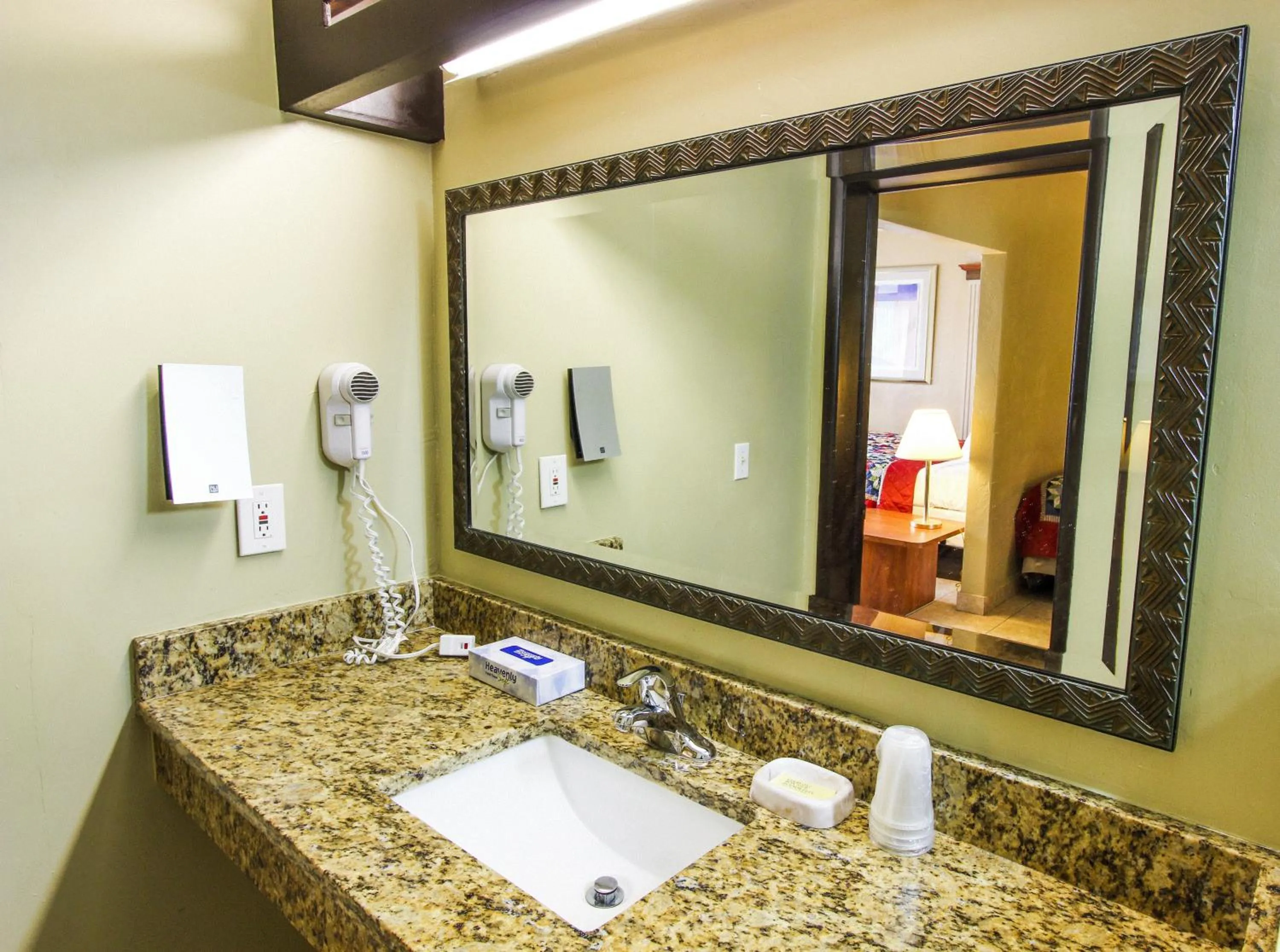 Bathroom in Oceans Beach Resort & Suites