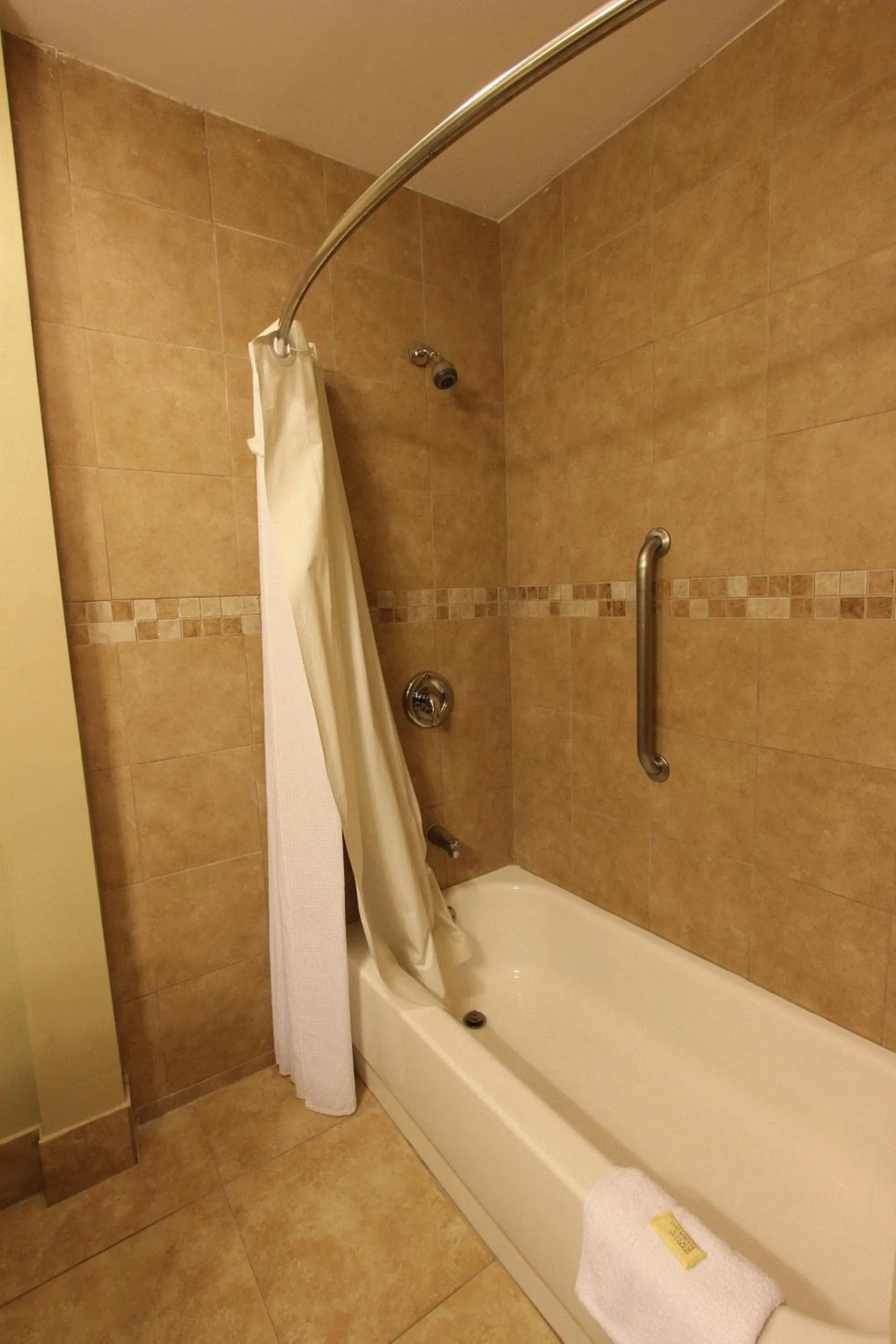 Bathroom in Oceans Beach Resort & Suites