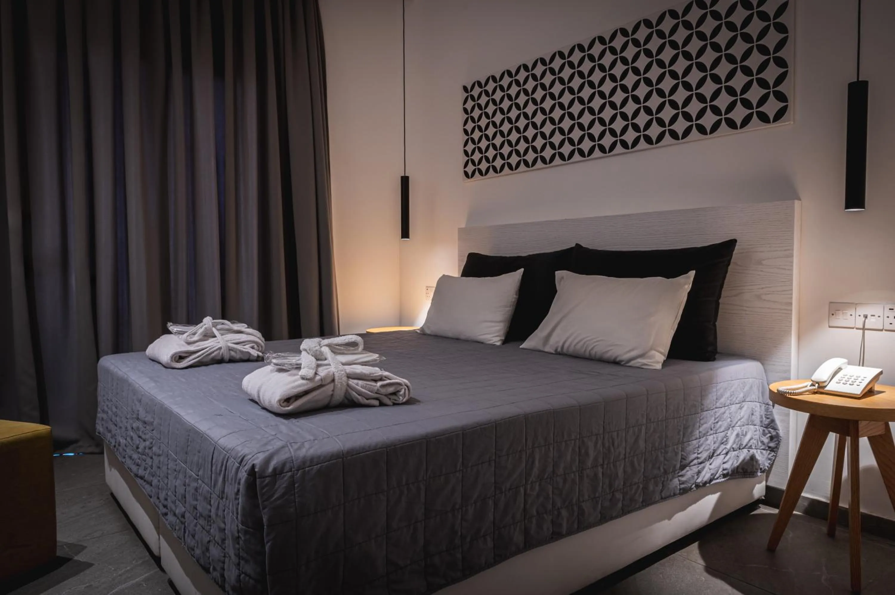 Bed in Kefalos Damon Hotel Apartments