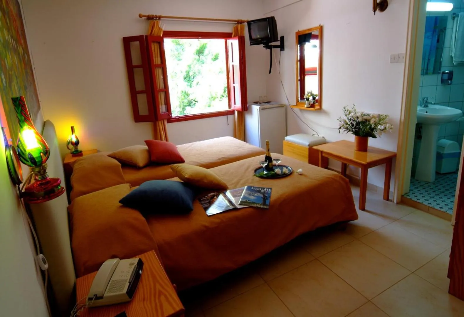 Bed in Kiniras Traditional Hotel & Restaurant