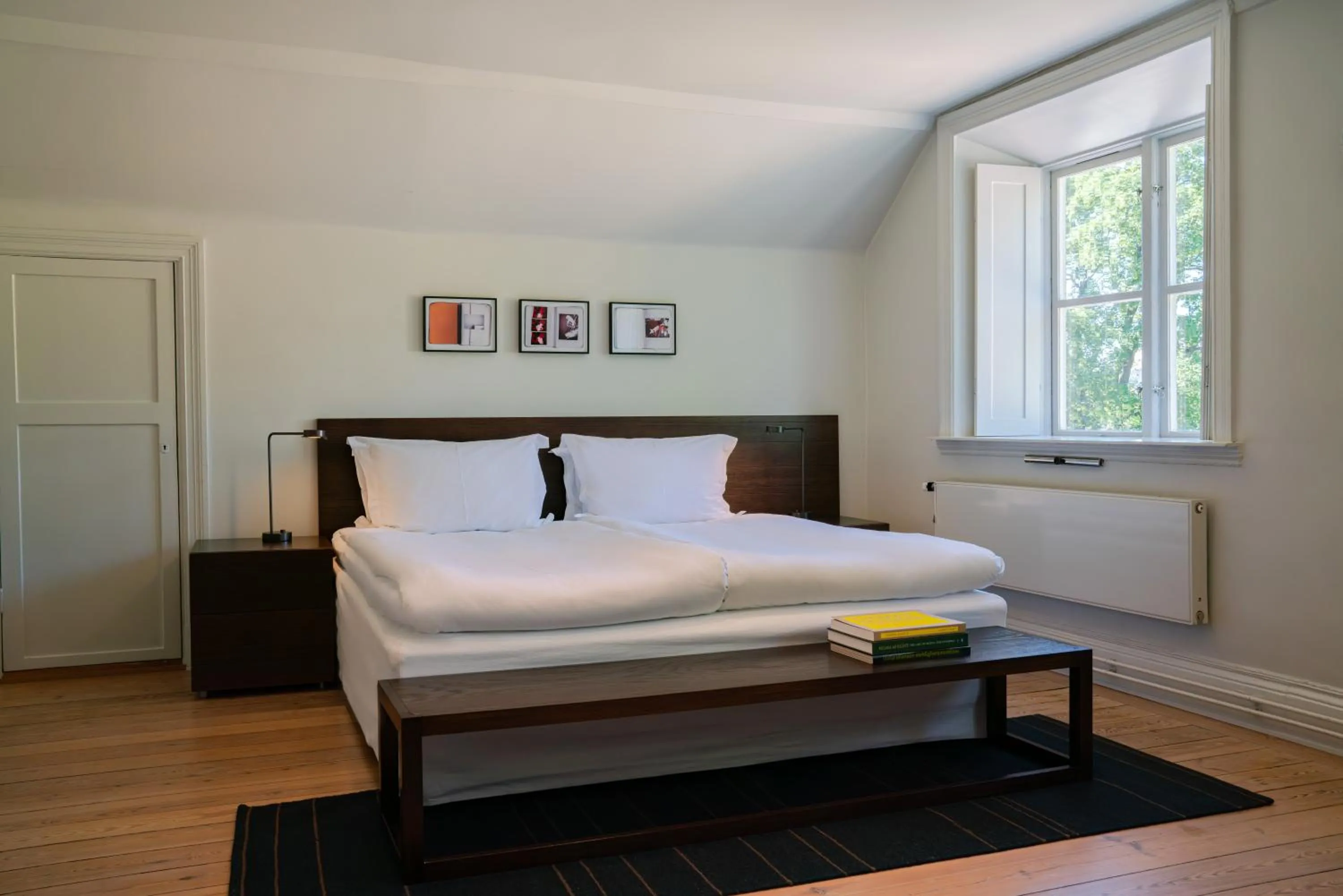 Bed in Hotel Skeppsholmen, Stockholm, a Member of Design Hotels