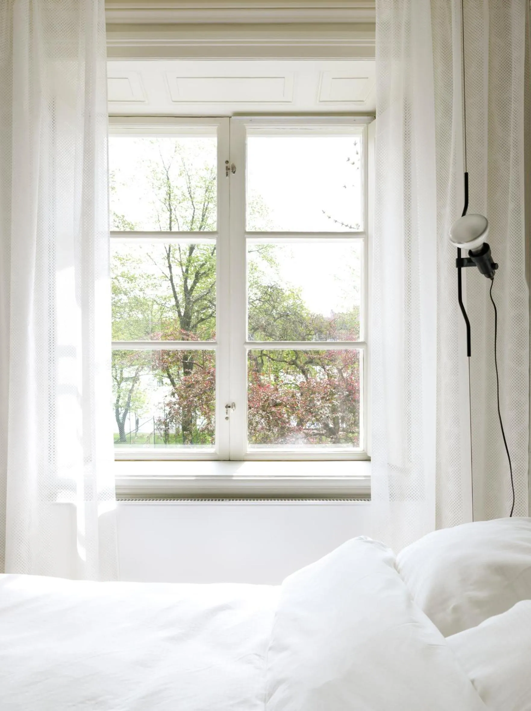 Bed in Hotel Skeppsholmen, Stockholm, a Member of Design Hotels