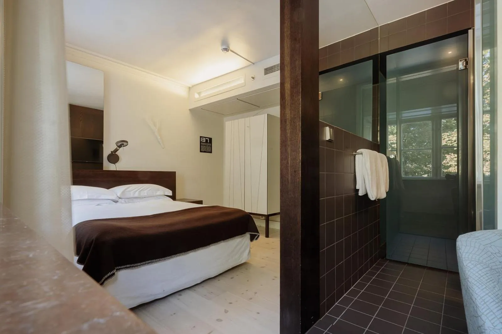 Bed in Hotel Skeppsholmen, Stockholm, a Member of Design Hotels