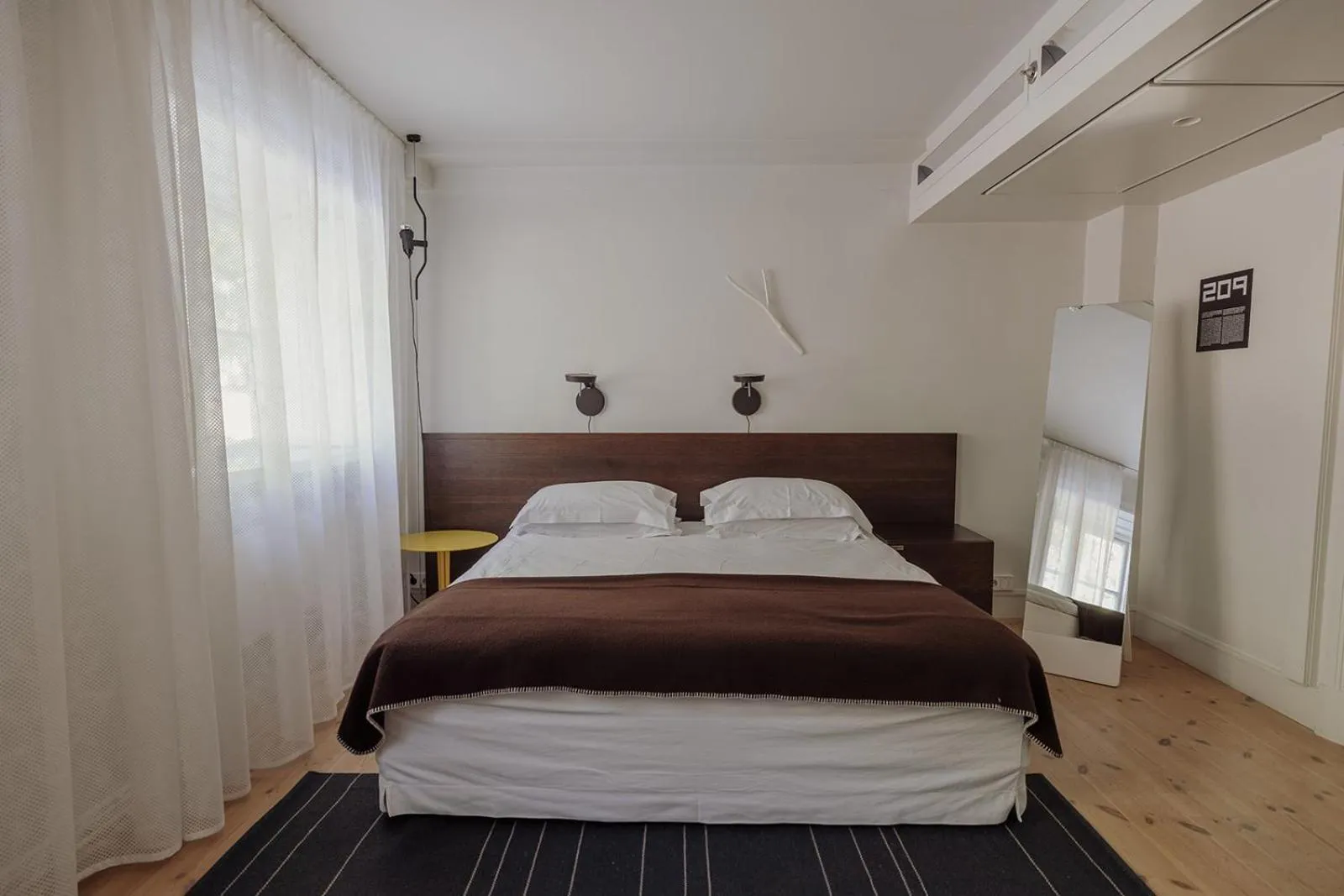 Bed in Hotel Skeppsholmen, Stockholm, a Member of Design Hotels