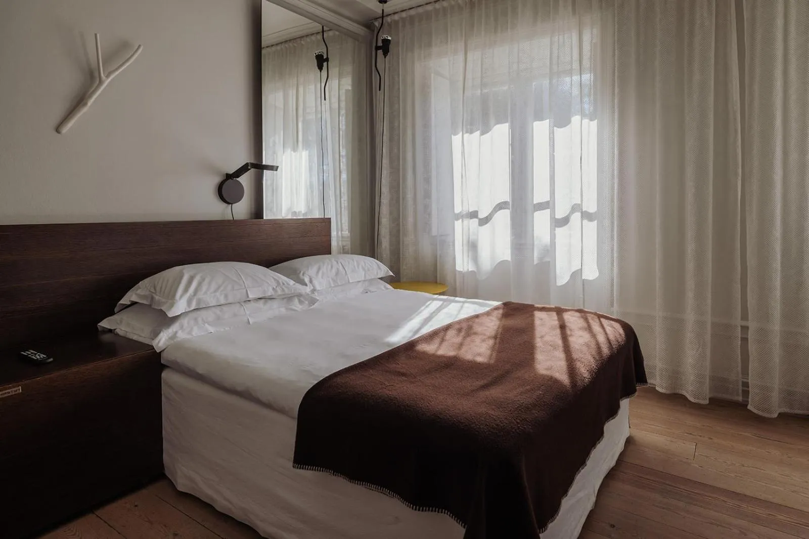 Bed in Hotel Skeppsholmen, Stockholm, a Member of Design Hotels