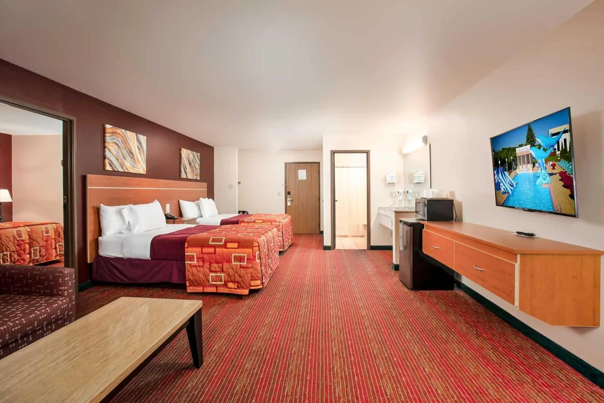 Bed in Grand Marquis Waterpark Hotel & Suites