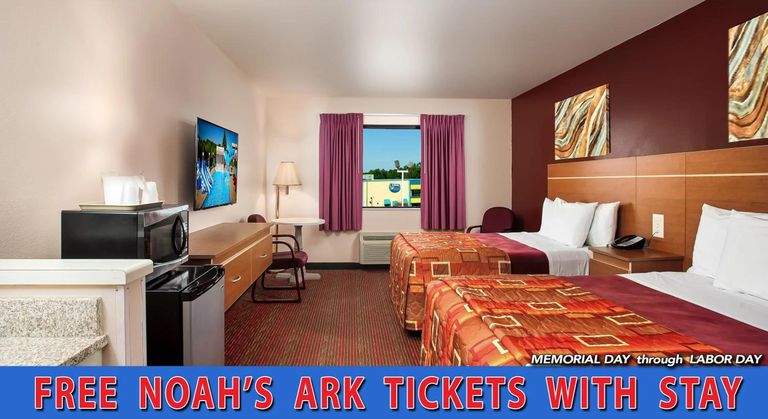 Bed in Grand Marquis Waterpark Hotel & Suites